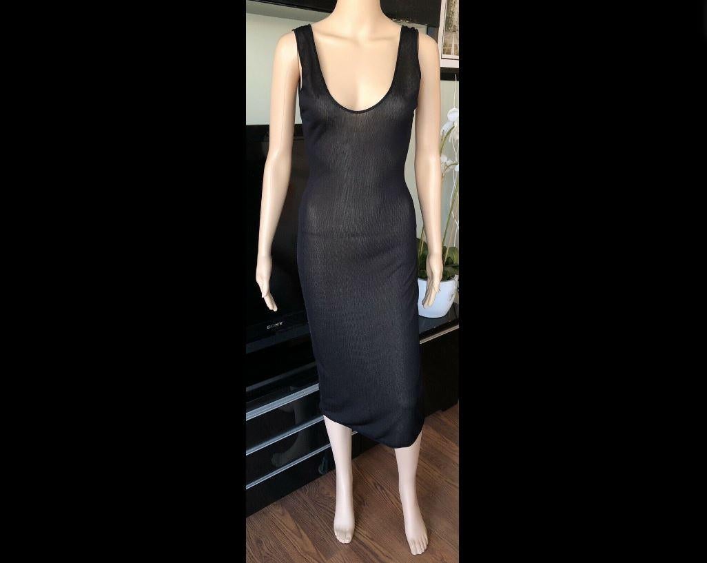 Black Alaïa sleeveless midi dress with scoop neck and open back S/M 
Please note size tag is missing , size is estimated from measurements.

All Eyes on Alaïa

For the last half-century, the world’s most fashionable and adventuresome women have