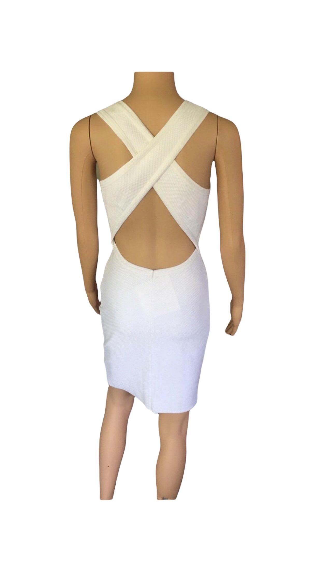 Azzedine Alaia Fitted Open Back Dress

White Alaïa sleeveless textured bodycon dress featuring scoop neckline, crossover straps at open back and concealed zip closure at side seam.

All Eyes on Alaïa

For the last half-century, the world’s most