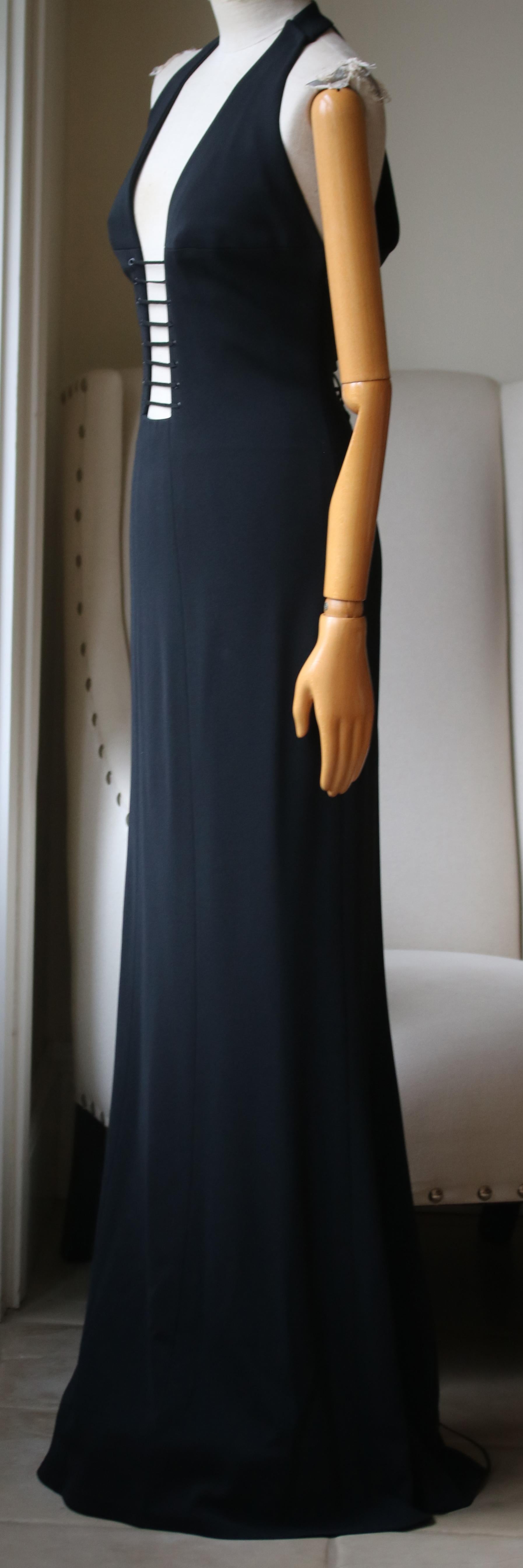 Azzedine Alaïa Haute Couture 2003 gown with lace up detail down the back. Deep v neck with cutout detail. Satin panels on the back. Size label has been cutout for comfort. 

Size: FR 40 (UK 12, US 8, IT 44)

Dimensions: Approx. 
Bust - 83.8 cm / 33