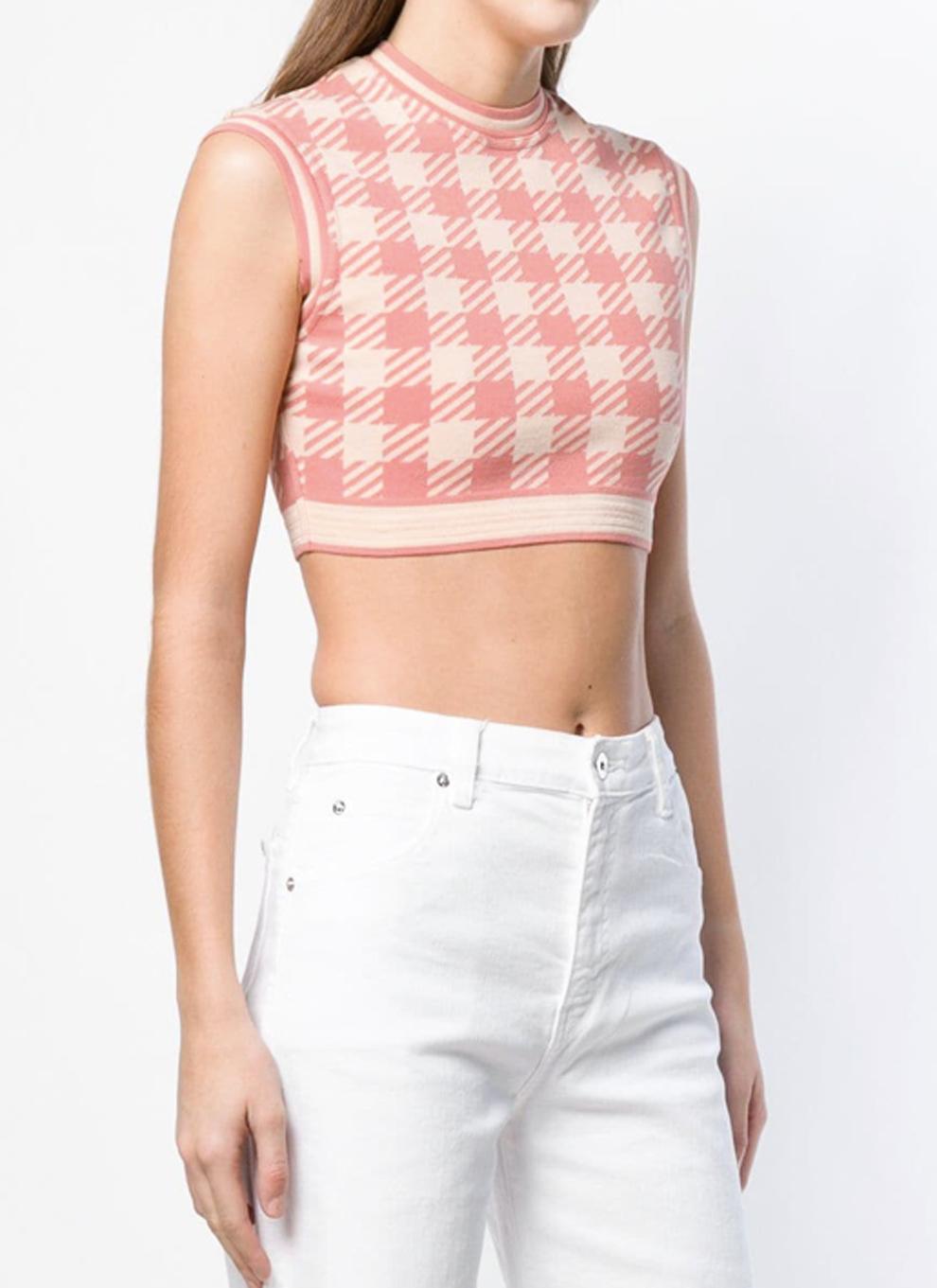  Azzedine Alaia  iconic S/S 1991 Tati top featuring a cropped shape, an ivory & pink print houndstooth pattern. An iconic piece from the collaboration between Alaïa and the legendary Parisian 'high street' brand. 
See catwalk & Azzedine Alaïa book-