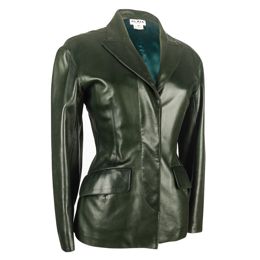 Spectacular jacket from the coveted Alaia 80's collection!
The most gorgeous shaping to this remarkably soft leather jacket.
Four button single breast jacket with hidden buttons when buttoned.
Each cuff has one working button.
Subtle and lovely