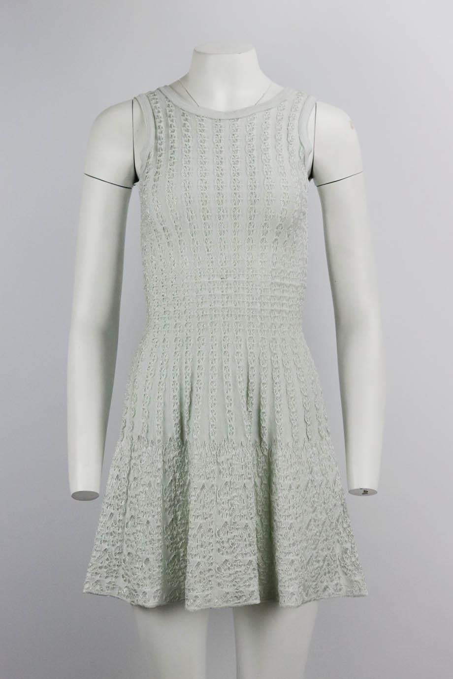 Azzedine Alaïa jacquard knit mini dress and cardigan set. Light-blue. Sleeveless, crewneck. Zip fastening at back. 95% Viscose, 5% polyamide. Size: FR 36 (UK 8, US 4, IT 40). Bust: 26 in. Waist: 21 in. Hips: 36 in. Length: 34 in
