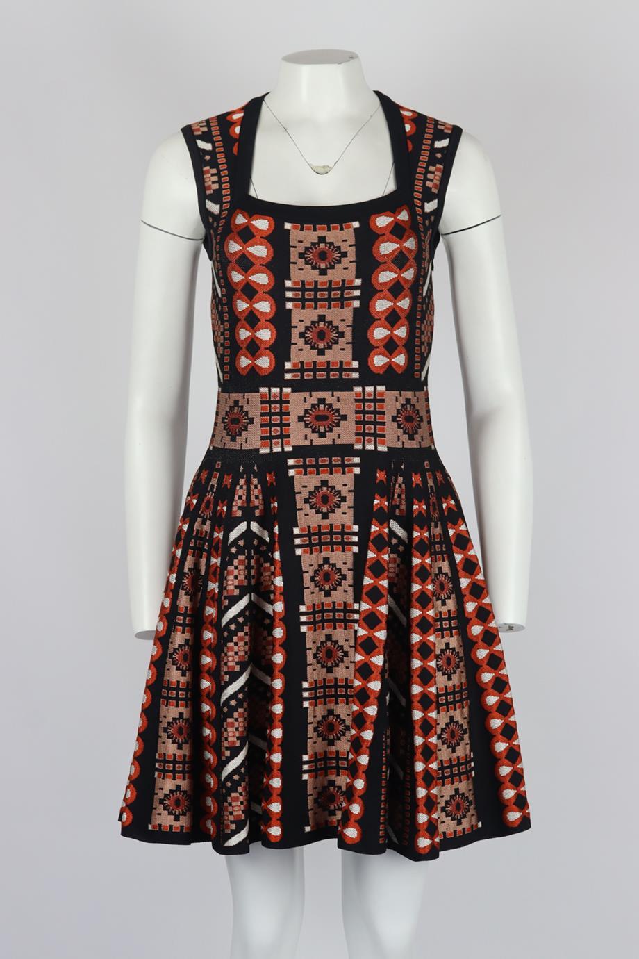 Azzedine Alaïa jacquard knit mini dress. Black, blush, orange and white. Sleeveless, square neck. Zip fastening at side. 90% Viscose, 6% polyester, 3% polyamide, 1% elastane. Size: FR 40 (UK 12, US 8, IT 44). Bust: 30.7 in. Waist: 26.5 in. Hips: 70