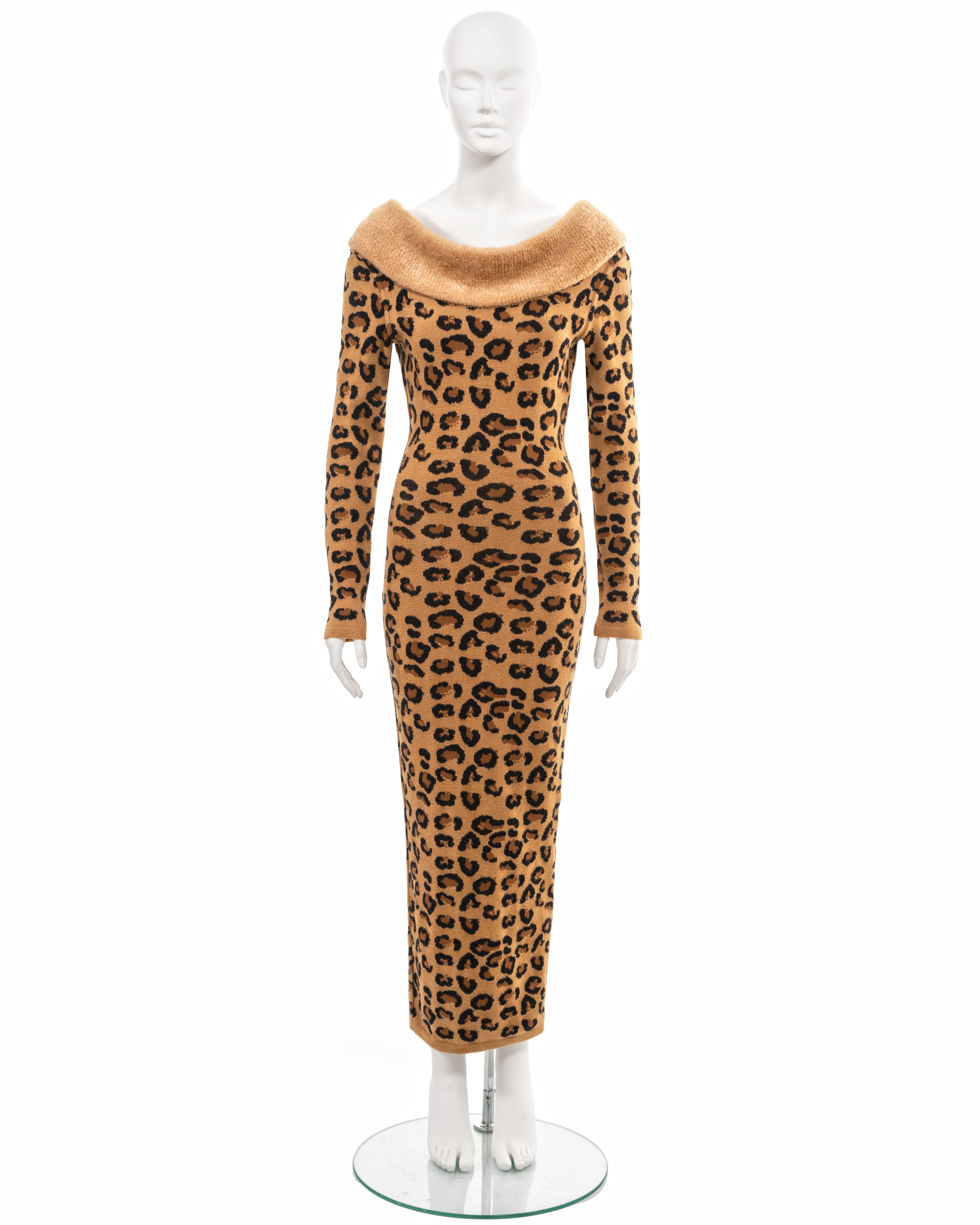 ▪ Azzedine Alaia archival dress
▪ Sold by One of a Kind Archive
▪ Fall-Winter 1991
▪ Museum Grade 
▪ Figure-hugging leopard knit in a worsted wool and rayon blend 
▪ Broad bateau neckline with ribbed collar 
▪ Long fitted sleeves 
▪ Zippers to back