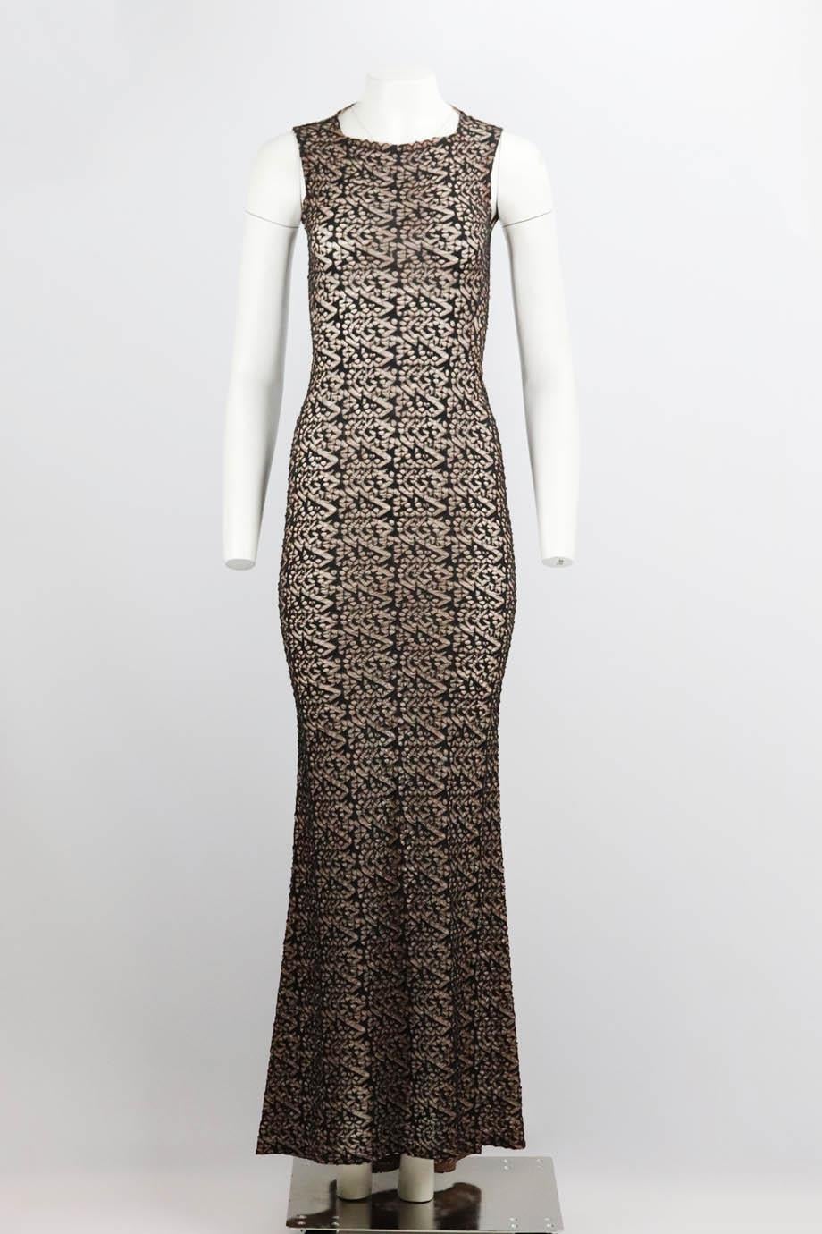 Azzedine Alaïa macramé lace maxi dress. Black and nude. Sleeveless, crewneck. Zip fastening at back. 40% Viscose, 40% polyamide, 20% silk. Size: FR 38 (UK 10, US 6, IT 42). Bust: 28 in. Waist: 24 in. Hips: 32 in. Length: 63 in
