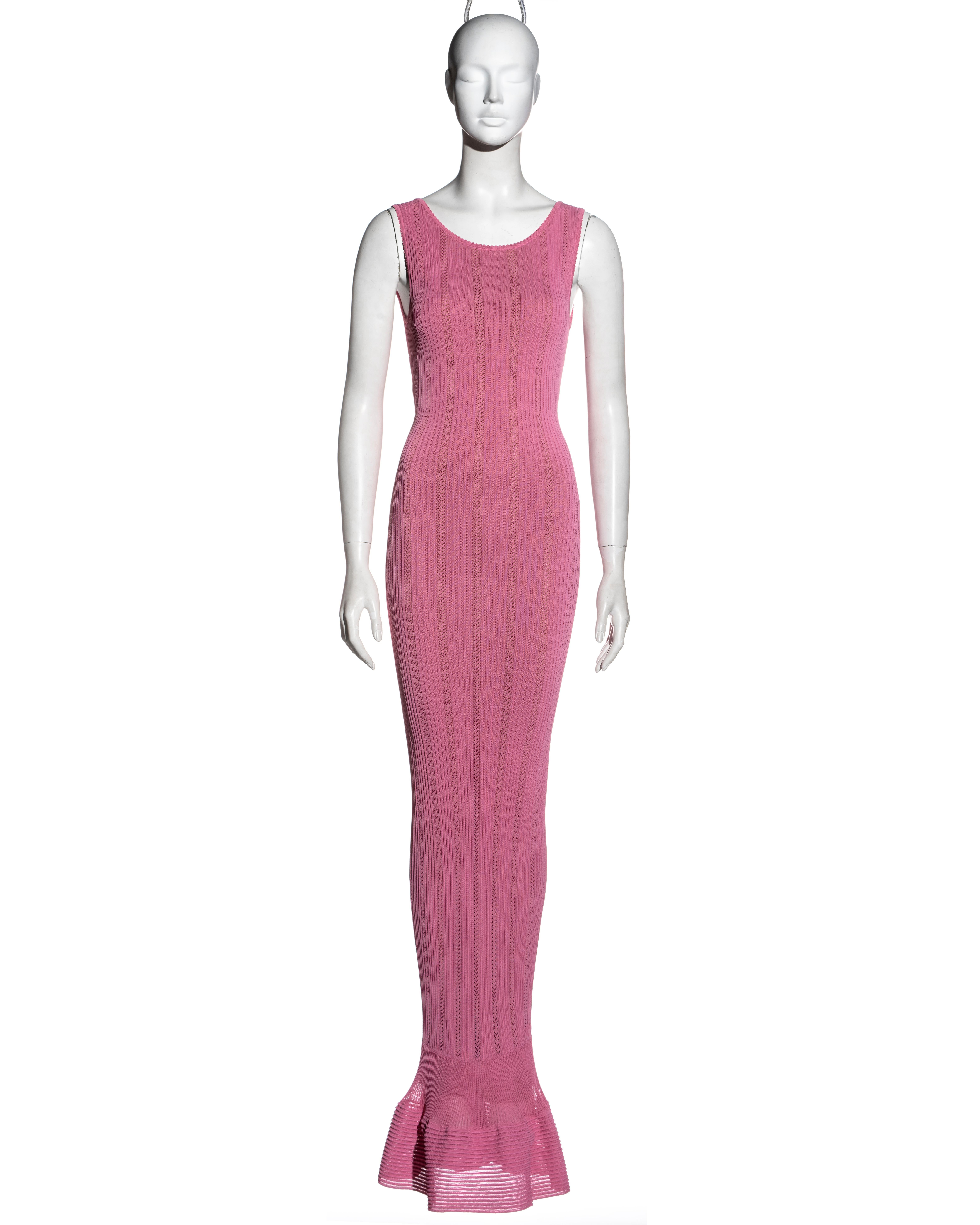 ▪ Azzedine Alaia pink rayon evening dress
▪ Stretch open-knit 
▪ Fishtail skirt 
▪ Figure hugging fit 
▪ Nude lining 
▪ Size 'XS'
▪ Spring-Summer 1996
▪ 100% Rayon
▪ Made in Italy