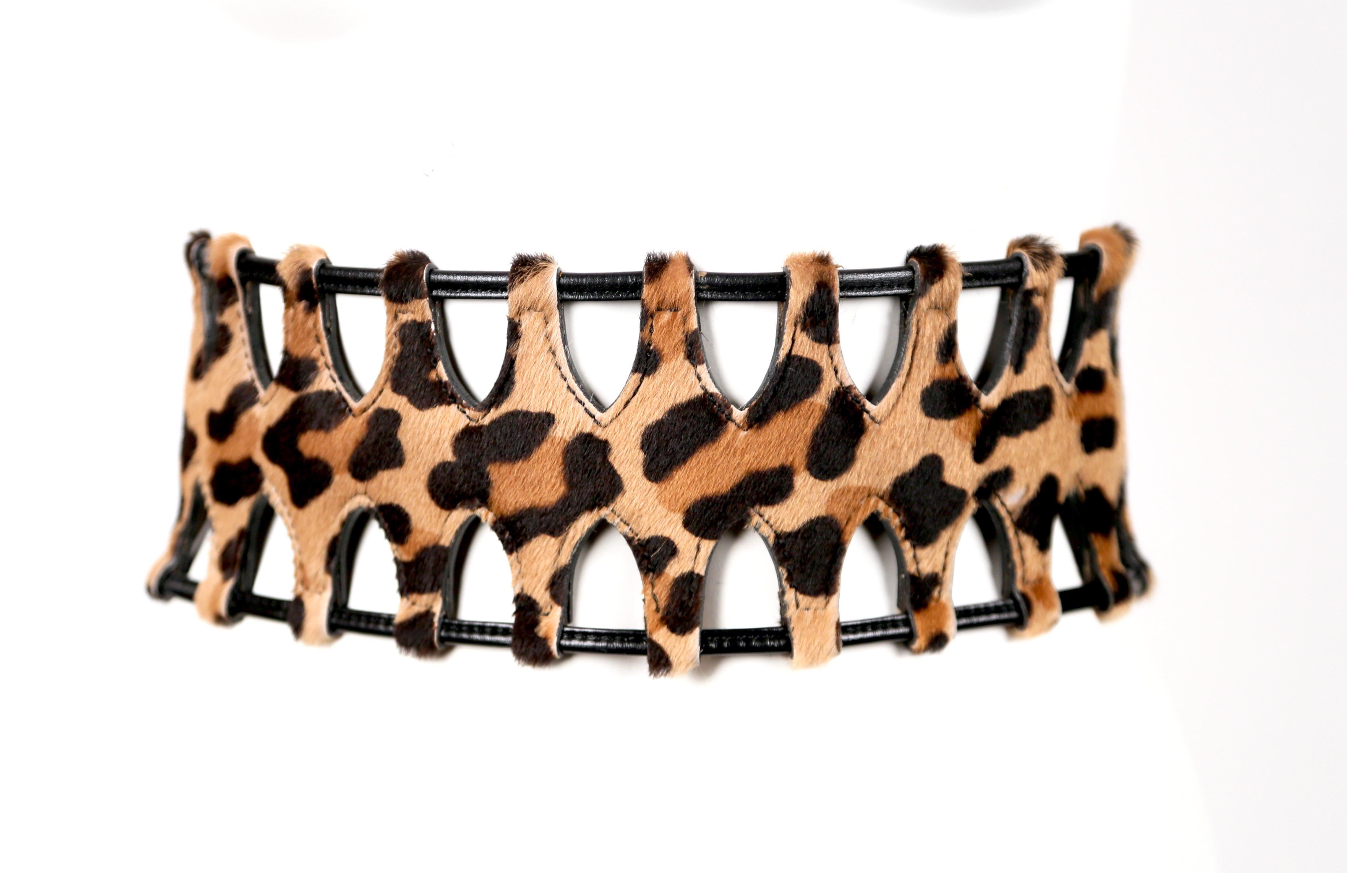 Very rare leopard printed pony fur cage belt with black leather trim from Azzedine Alaia dating to 1991 exactly as seen on the fall runway. Labeled a French size 65. Belt best fits a size 2. Belt measures approximately: just under 4