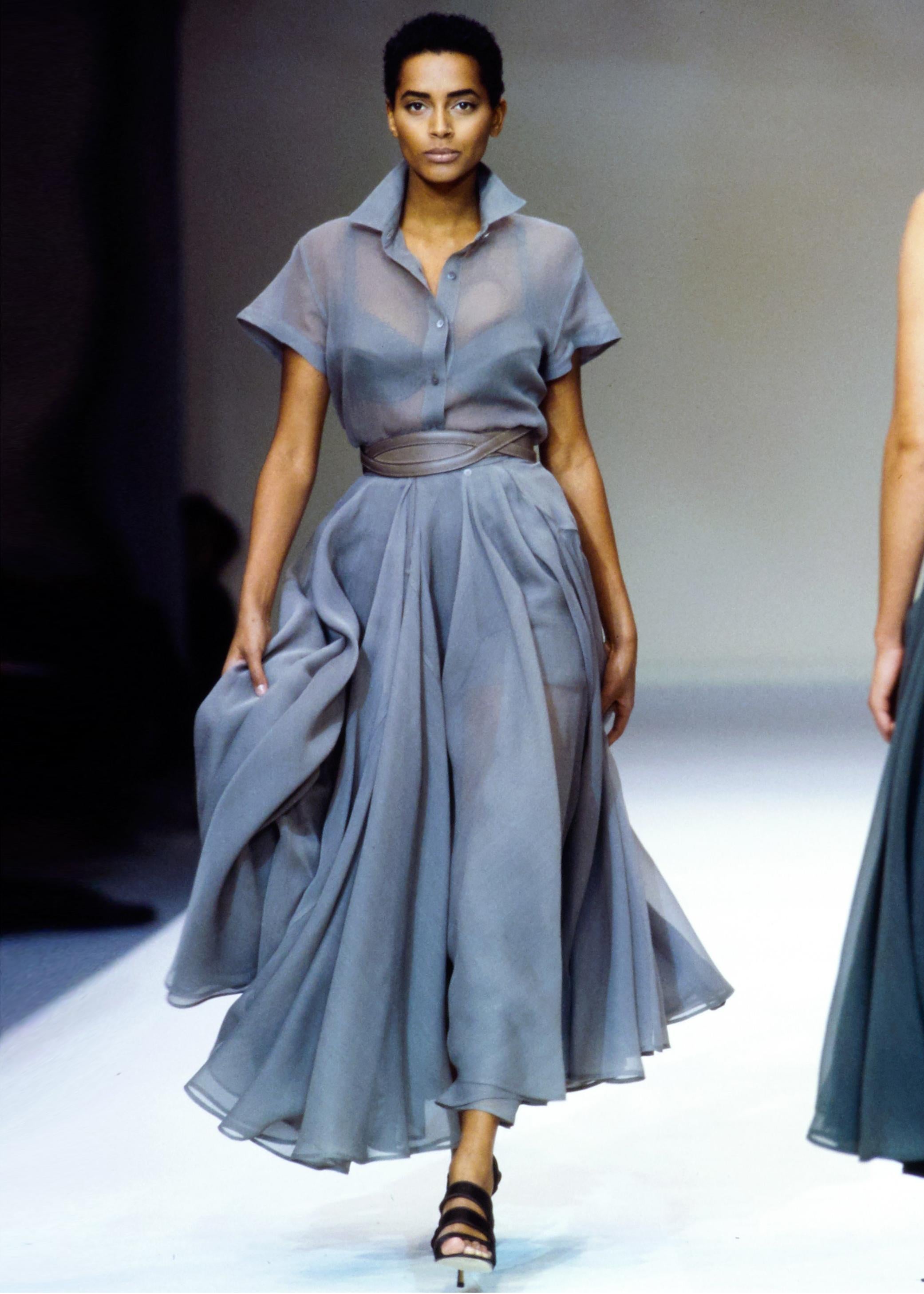 ▪ Azzedine Alaia powder blue crepe chiffon set
▪ Button up short-sleeve blouse 
▪ Ankle-length voluminous circle skirt with pleating 
▪ Size Small, Waist 23.5
