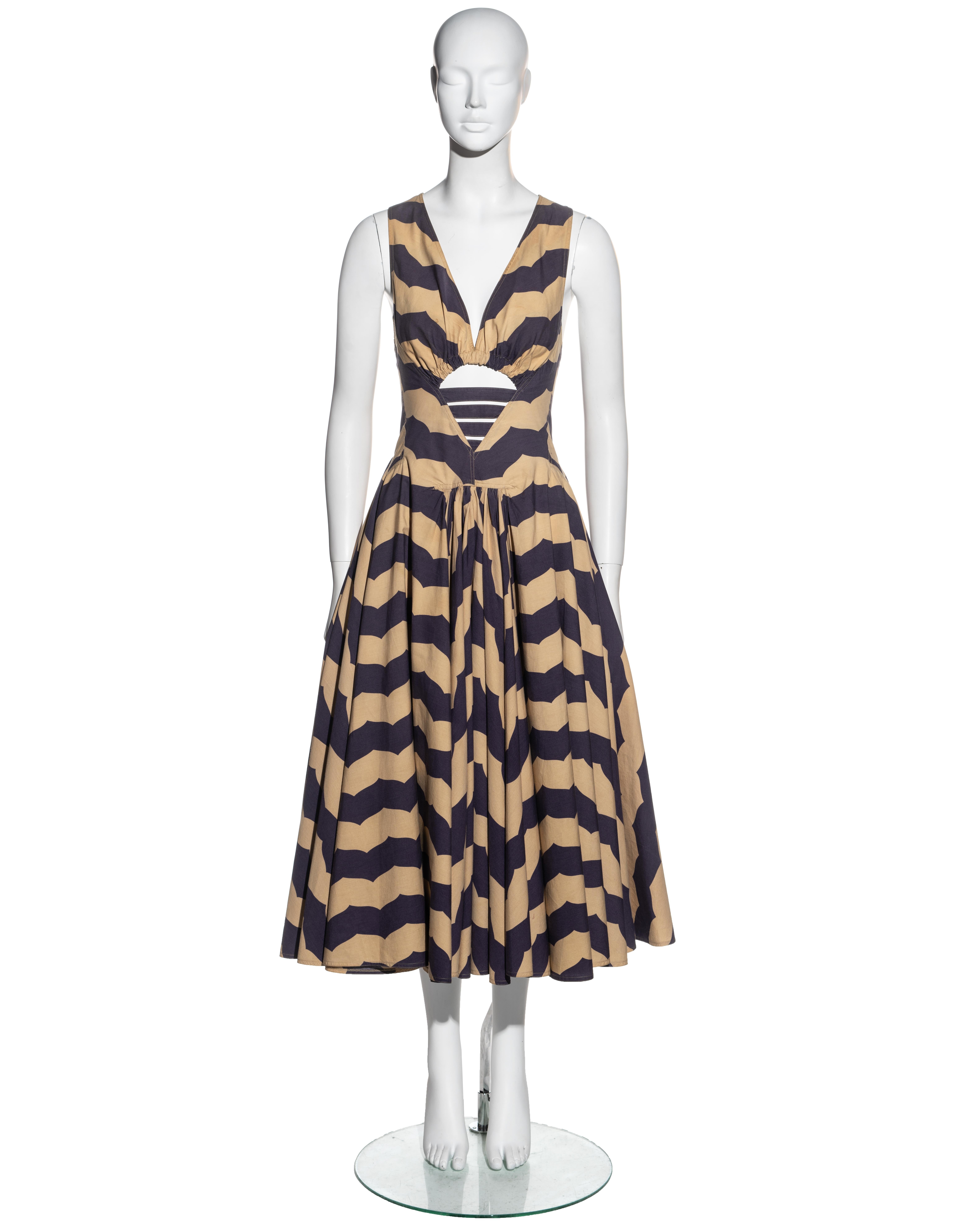▪ Azzedine Alaia purple and beige striped cotton dress 
▪ Plunging neckline 
▪ Broad straps 
▪ Midriff cut out 
▪ Cinched waist
▪ Long pleated circle skirt 
▪ Concealed zipper at centre back 
▪ 2 side pockets 
▪ Ankle length 
▪ Criss cross straps at