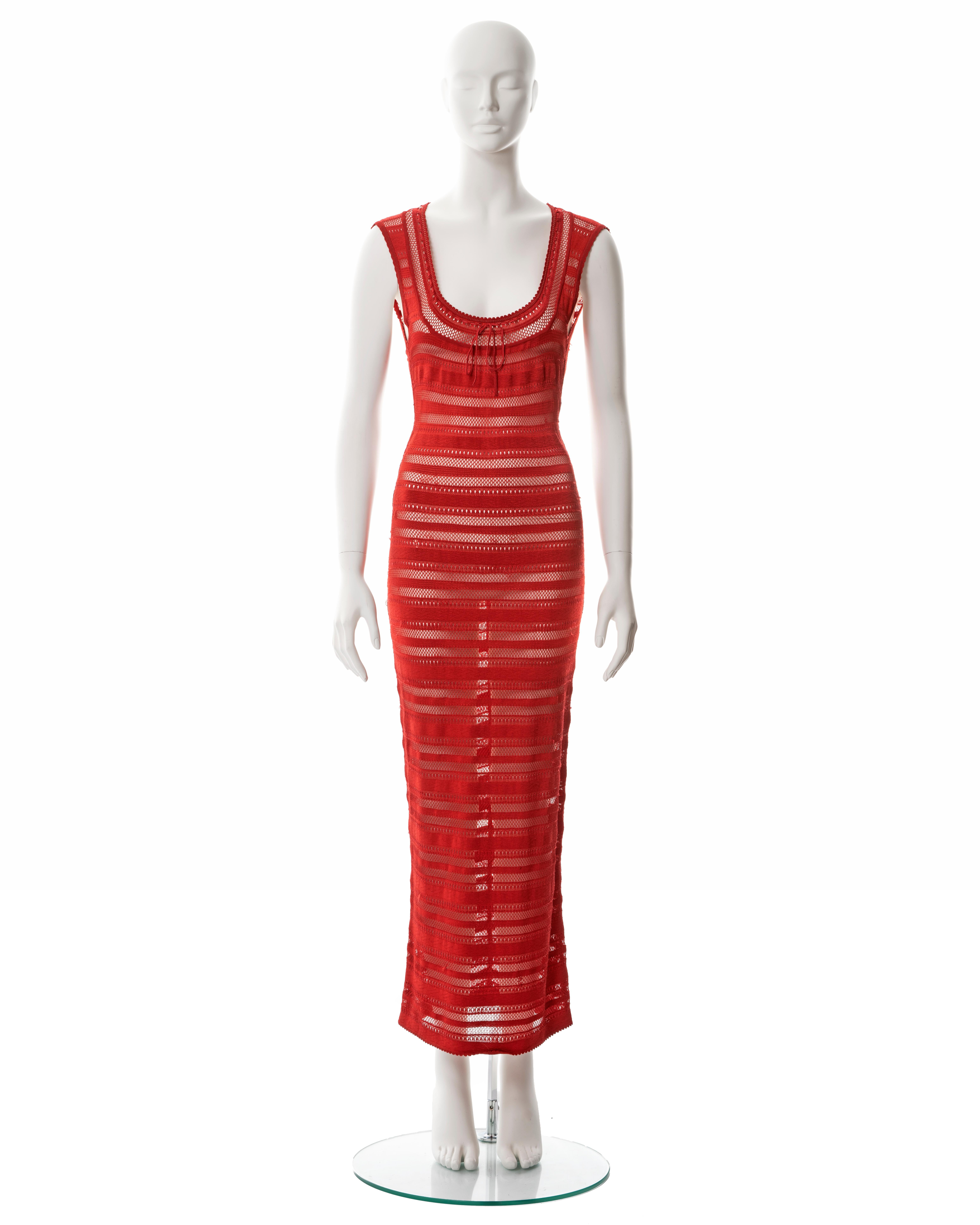 ▪ Azzedine Alaia red open knit maxi dress
▪ Spring-Summer 1993
▪ Scoop neckline with drawstring ties 
▪ Figure-hugging fit 
▪ Horizontal open-knit stripes 
▪ Size Small
▪ Made in Italy

All photographs in this listing EXCLUDING any reference or