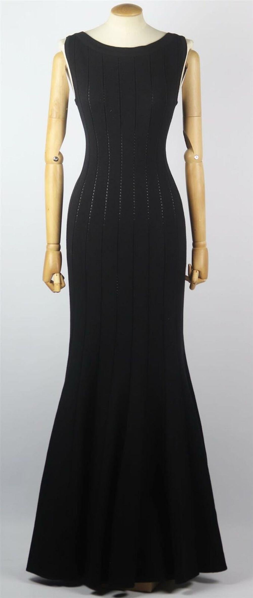 This maxi dress by Azzedine Alaïa is knitted from stretchy ribbed wool-blend that holds the shape and volume of the pleats beautifully and nips in perfectly at the waist for an elongated silhouette.
Black wool-blend.
Concealed zip fastening at