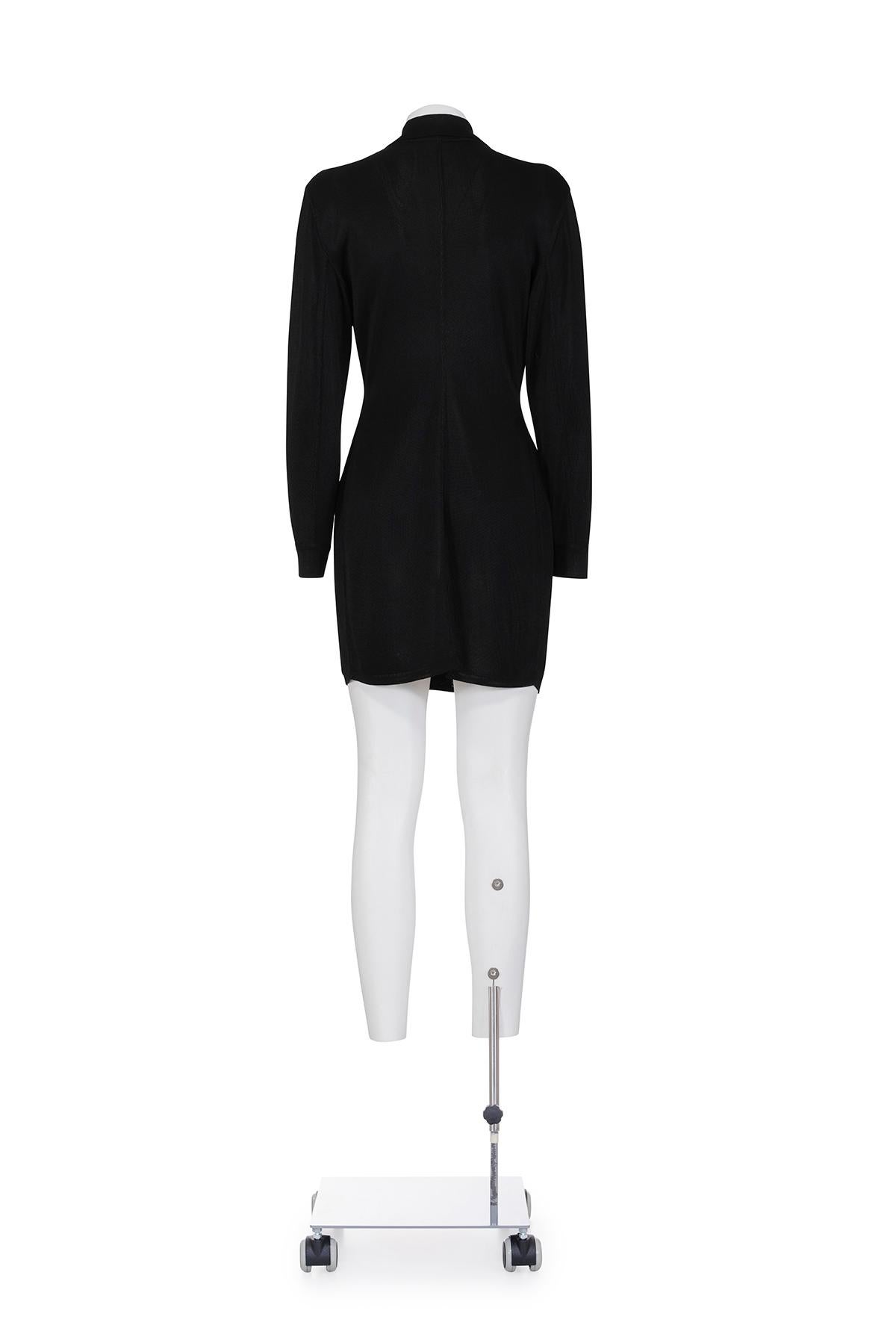 Spring Summer 1986 iconic and rare knitted shirt dress by Azzedine Alaïa
Silver press buttons on the front
The composition is 100% acetate
