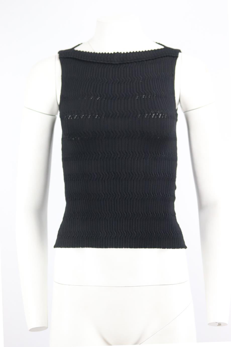 Azzedine Alaïa stretch knit top. Black. Sleeveless, crewneck. Zip fastening at side. 100% Viscose. Size: FR 36 (UK 8, US 4, IT 40). Bust: 20 in. Waist: 18 in. Hips: 22 in. Length: 18 in
