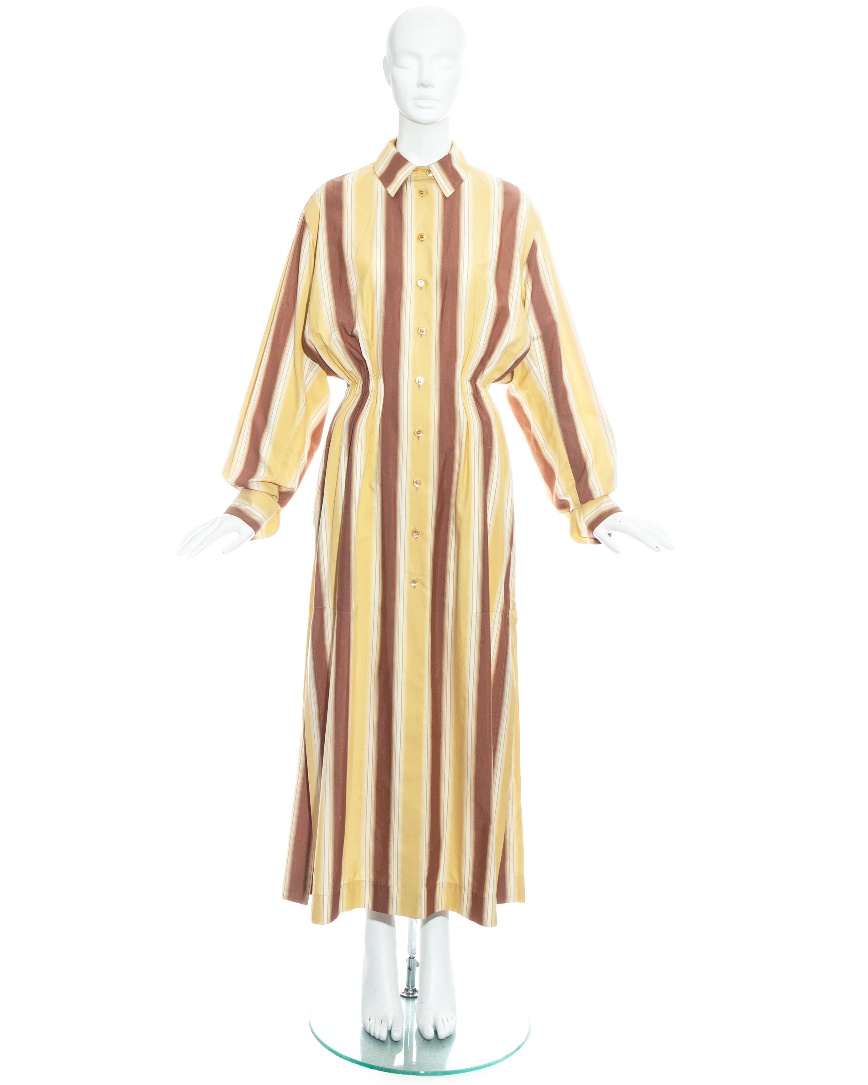 Azzedine Alaia striped cotton maxi shirt dress. Oversized fit with elasticated waistband, turn over cuffs, built in waist stay and 2 side pockets.

Spring-Summer 1992
