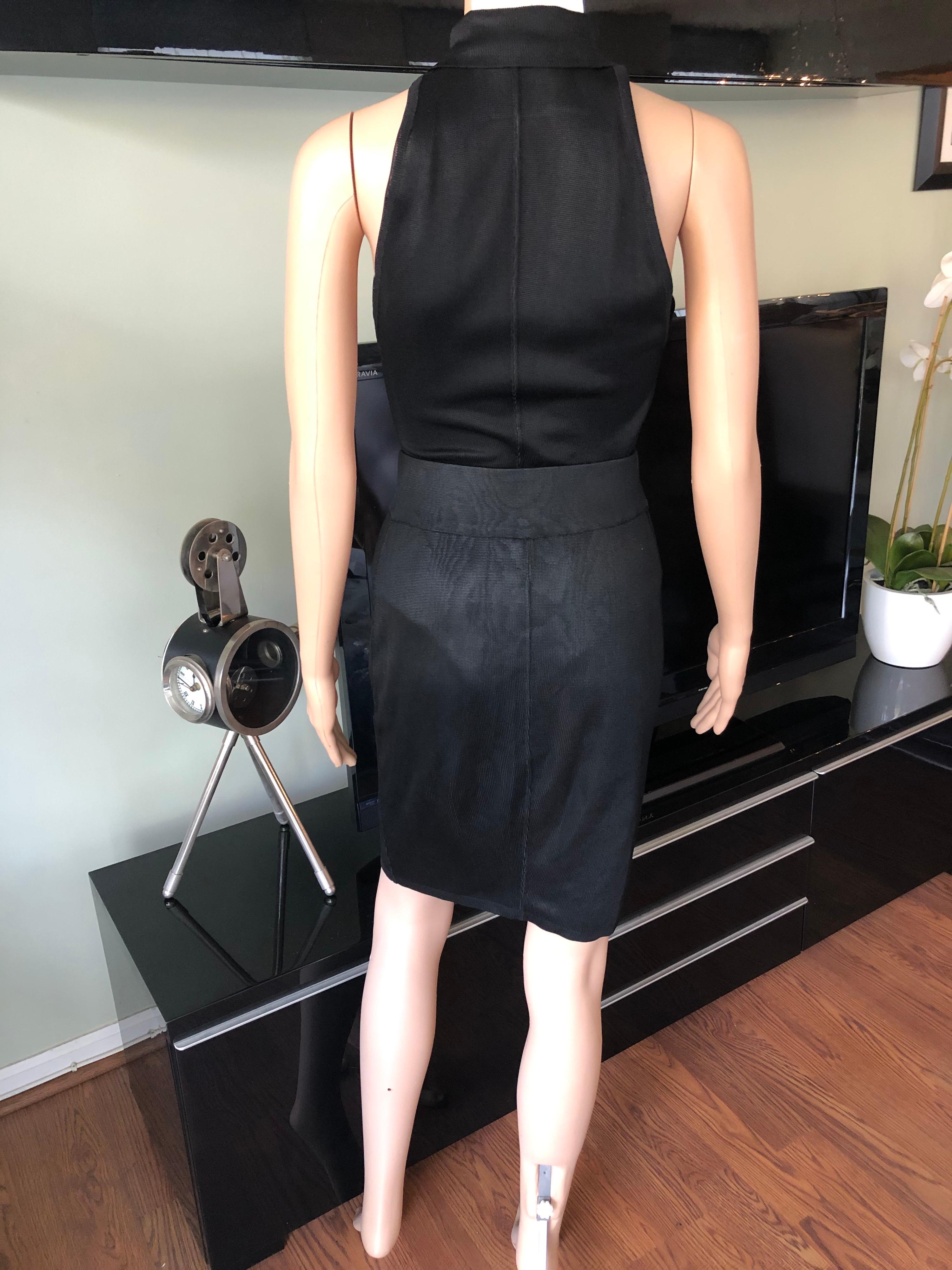black bodysuit with black skirt