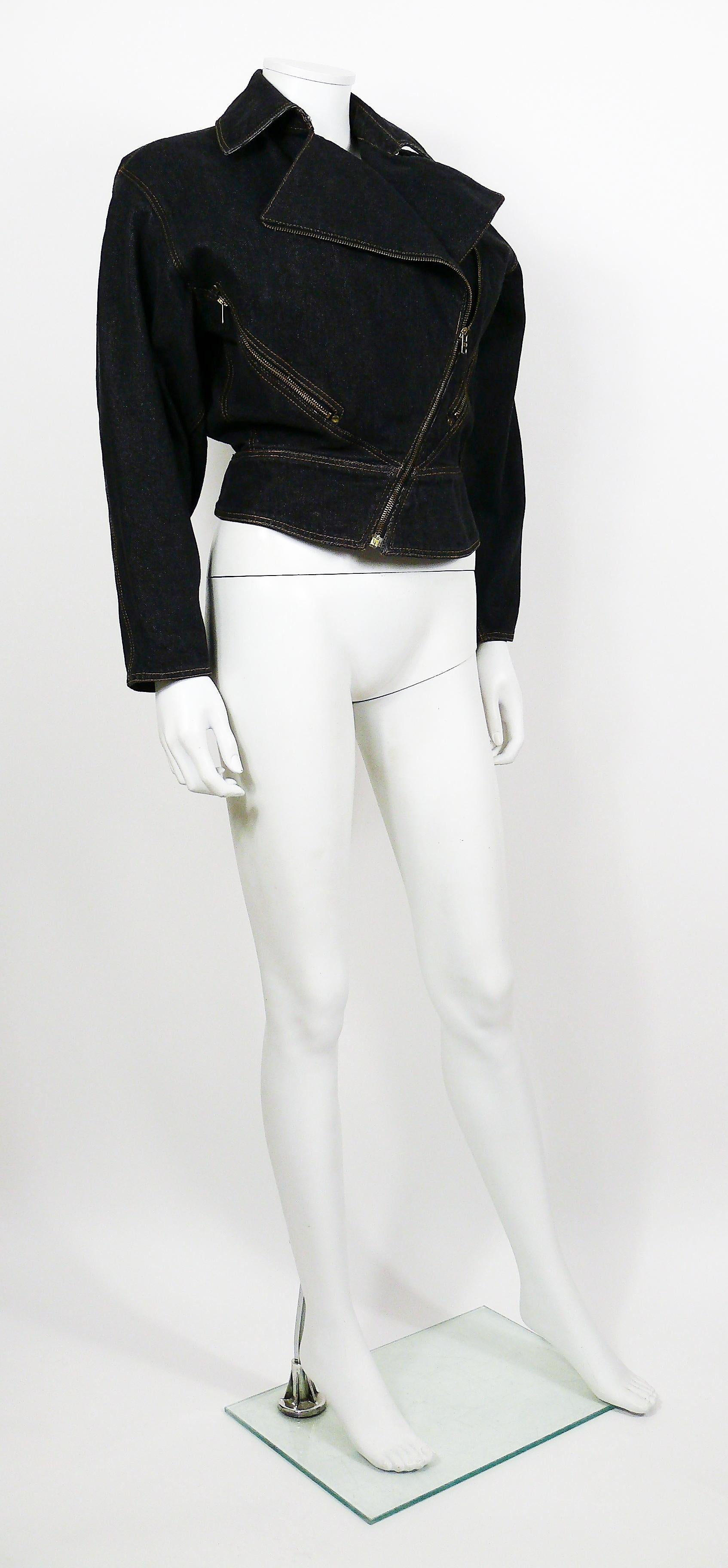 AZZEDINE ALAIA vintage black denim jacket with brass zip closures.   

Label reads ALAIA Paris.
Made in France.

Size tag reads FR 38 / D 36 / US 6 / GB 10.

Composition label reads : 100 % Cotton. 

Indicative measurements taken laid flat (double