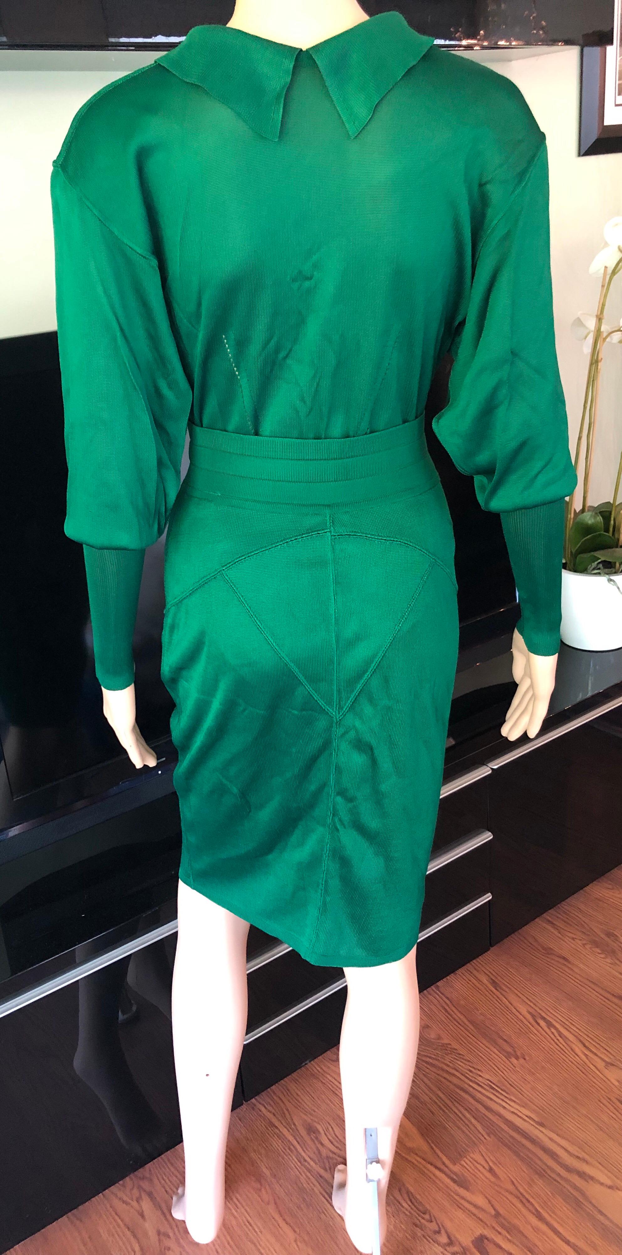 Azzedine Alaia Vintage Fitted Skirt and Bodysuit Top 2 Piece Set 

Emerald Alaïa knit skirt set. Long sleeve bodysuit features pointed collar, button closures at back and snap closures at bottom. Please note the bodysuit is very versatile and can be