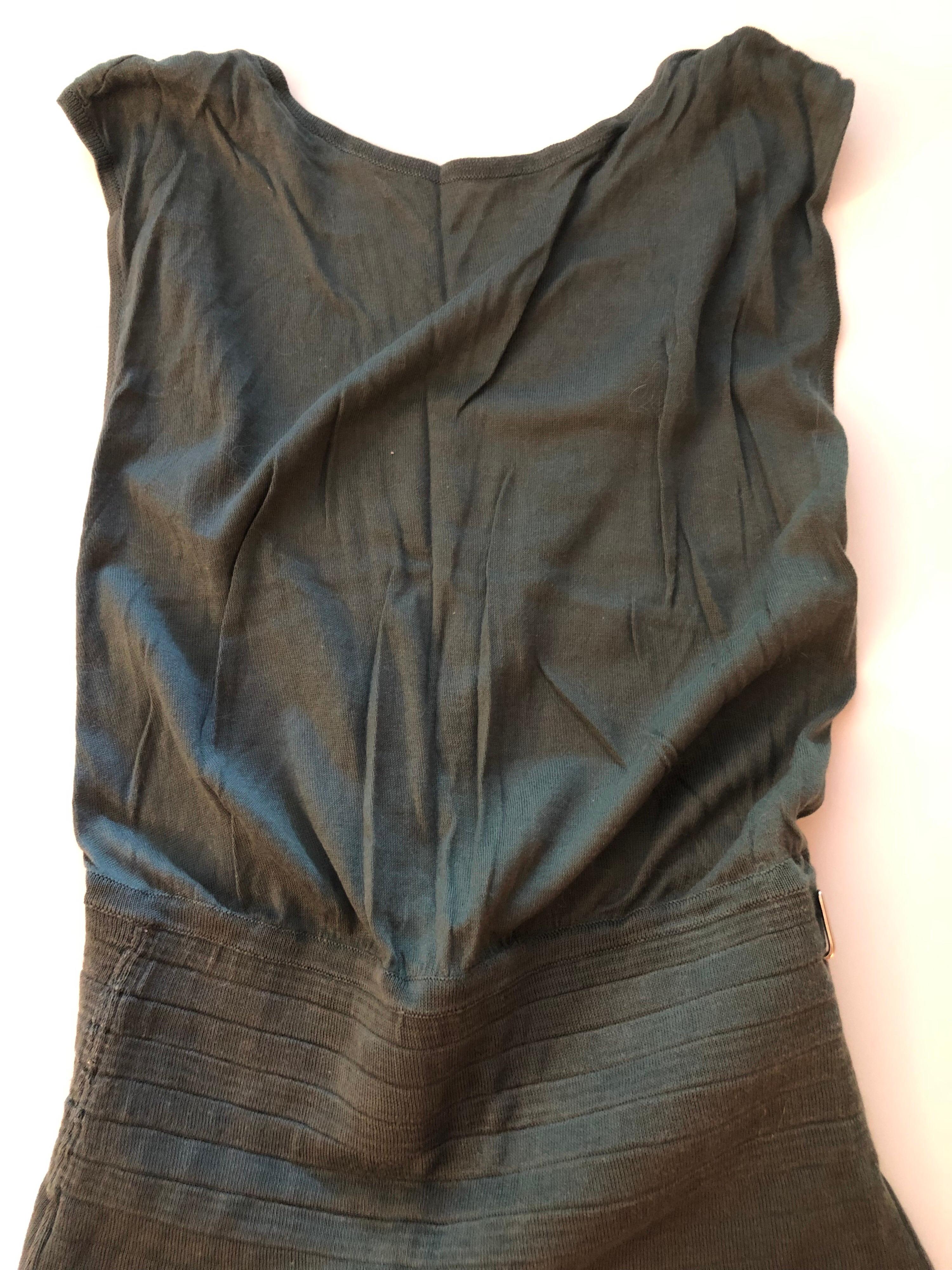 Jade Alaïa sleeveless bodysuit with scoop neck, knit detailing throughout, cutout at back and snap closures at bottom. Size not listed, estimated from measurements.

All Eyes on Alaïa

For the last half-century, the world’s most fashionable and
