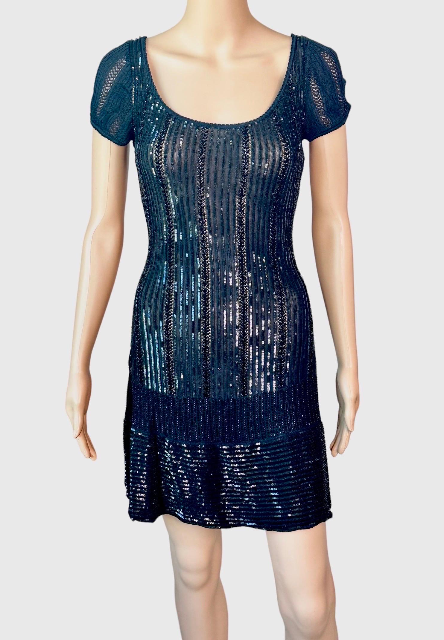 Azzedine Alaia Vintage S/S 1996 Black Sequin Beaded Embellished Mini Dress Size M

Black vintage Alaïa beaded dress featuring bead and sequin embellishments throughout and scoop neck.



