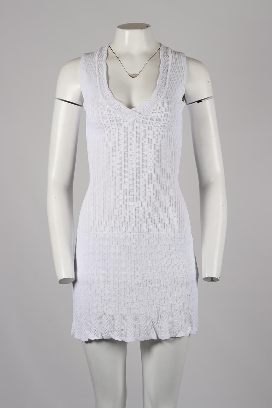 Azzedine Alaïa Vintage Stretch Knit Mini Dress. White. Sleeveless. V-Neck. Zip fastening - Back. 90% Viscose, 6% polyamide, 4% elastane. XSmall (UK 6, US 2, FR 34, IT 38). Bust: 30 in. Waist: 24 in. Hips: 38 in. Length: 32.5 in. Condition: Used.