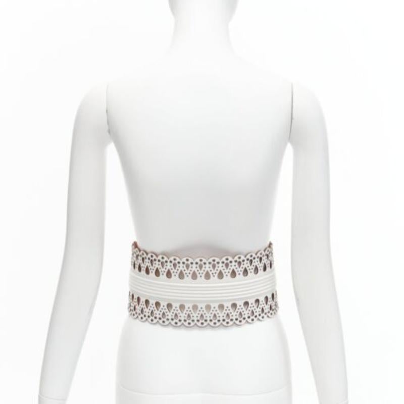 Women's AZZEDINE ALAIA white laser cut studded leather corset waist belt 70cm