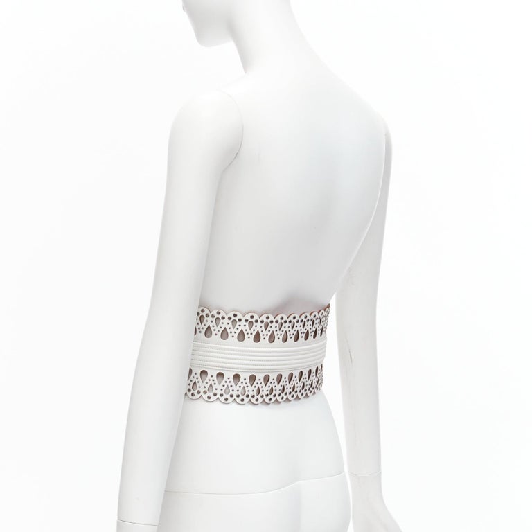 AZZEDINE ALAIA white laser cut studded leather corset waist  display picture 1
