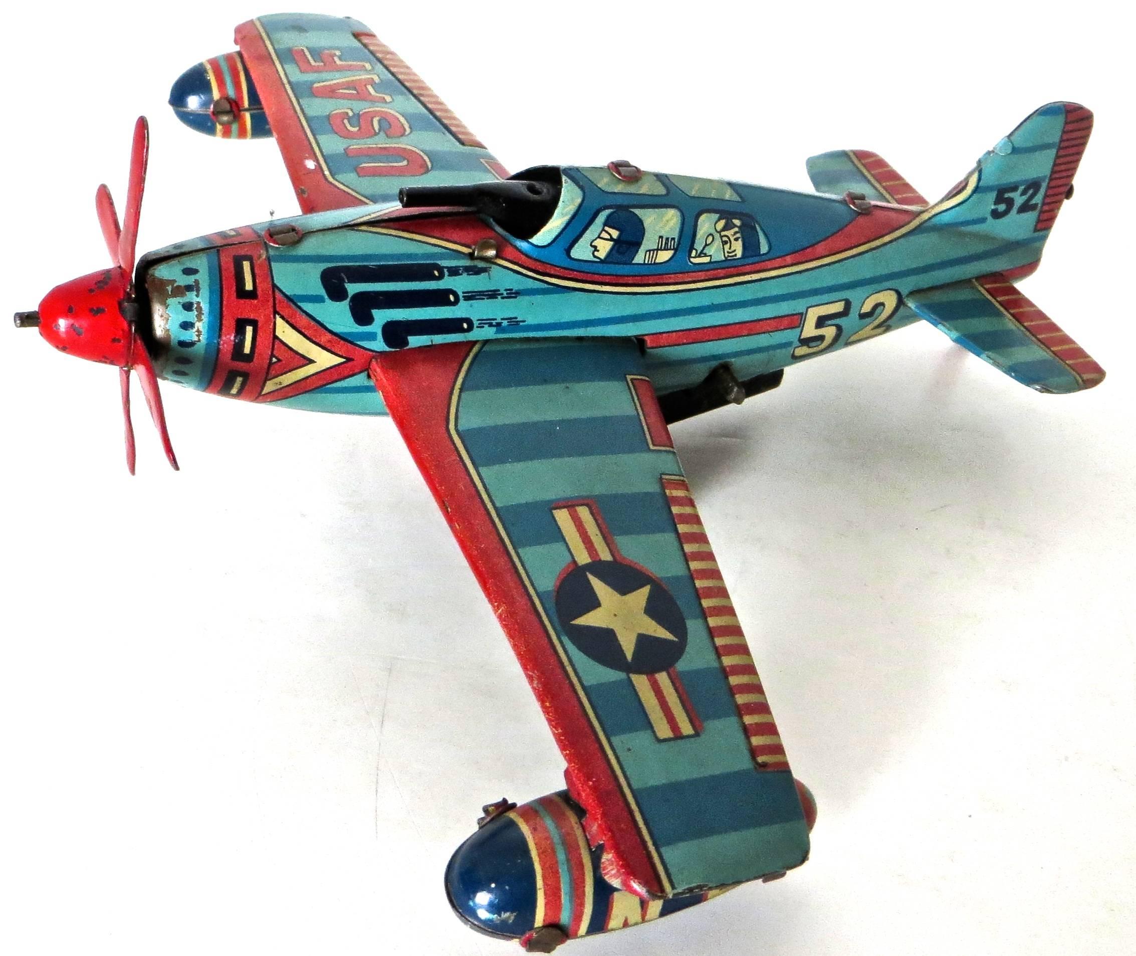 Excellent and all original condition tinplate lithographed and hand painted all tin toy airplane 