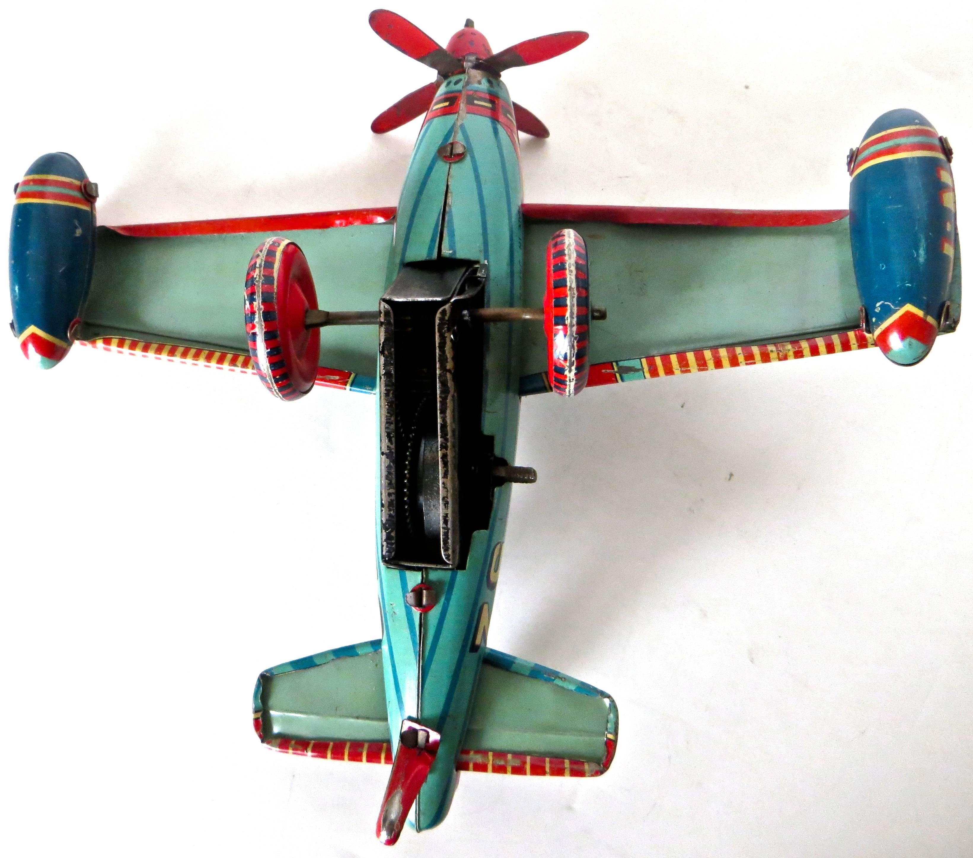 Folk Art B-52 Tin Toy Wind-Up Airplane, Japan, circa 1950s