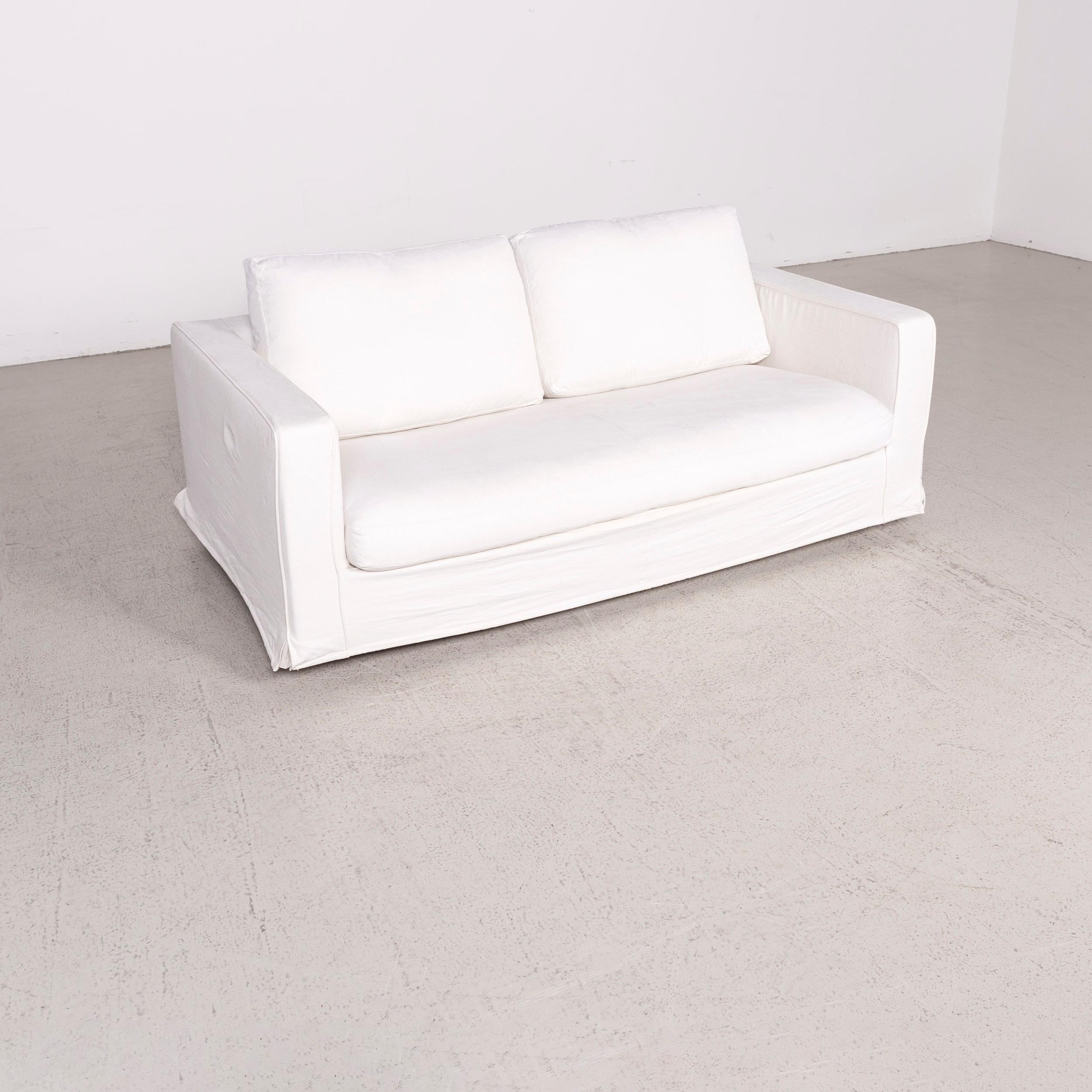 We bring to you a B & B Italia Baisity designer fabric sofa white by Antonio Citterio two-seat.

Product measurements in centimeters:

Depth 100
Width 175
Height 80
Seat-height 40
Rest-height 60
Seat-depth 50
Seat-width 145
Back-height