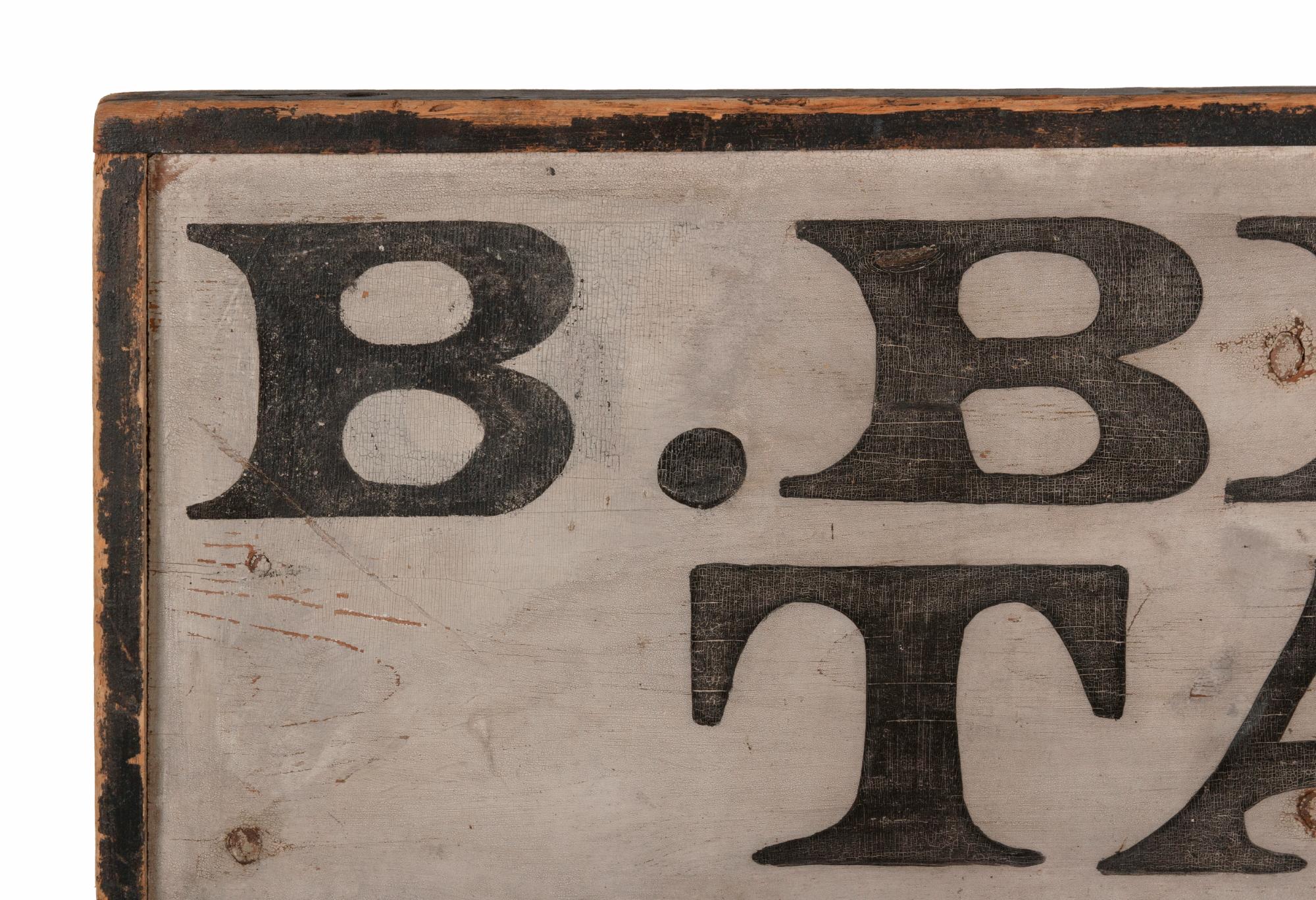 Early American trade sign: “B. BRISCOE, TAILOR,” circa 1810-1850, with a backwards “S” and extraordinary surface

Early, painted, American trade sign, made of pine, with a molded edge, applied with “T”-head nails. In very dark green, almost black,