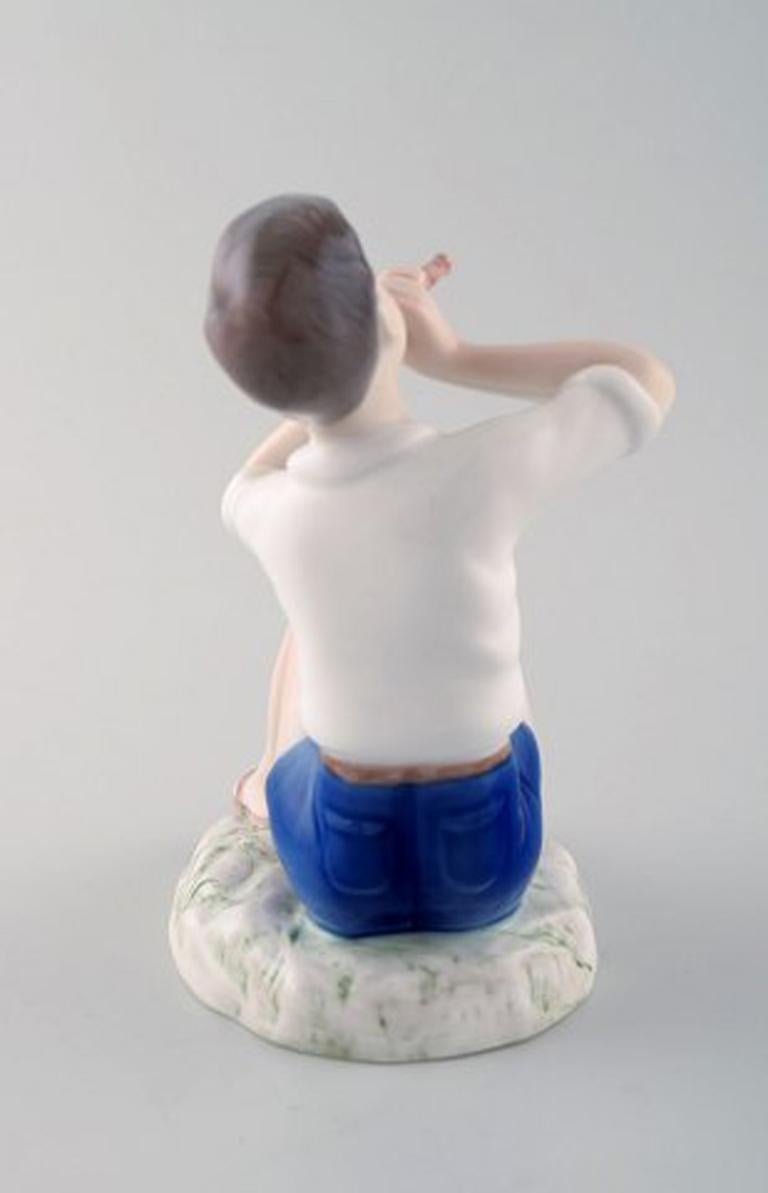 B & G / Bing & Grondahl, Boy Playing on Flute, Number 2344 In Excellent Condition For Sale In Copenhagen, DK