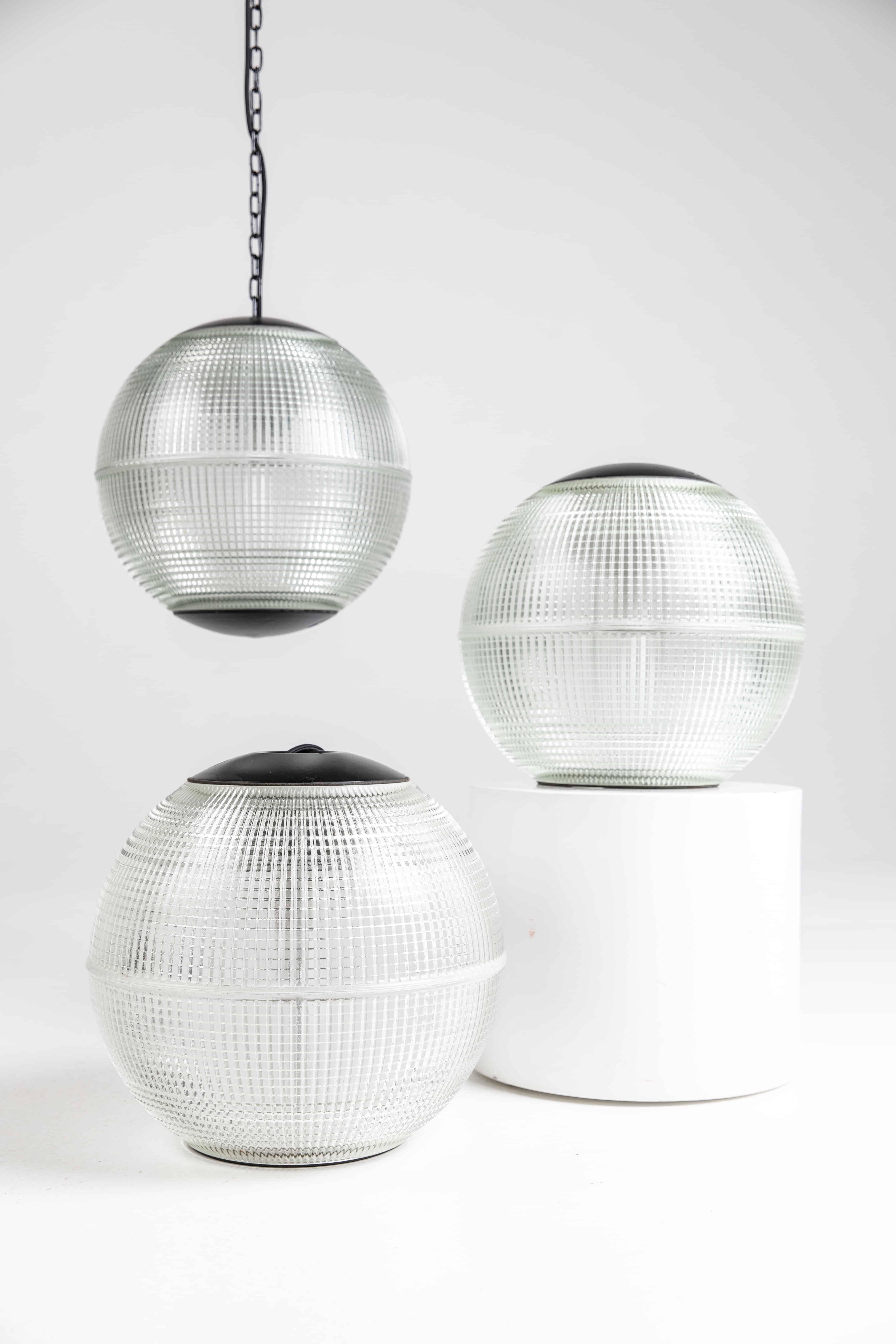 NOTE: These lights have a varying degree of cosmetic damage - mostly chips.

Please contact us if you wish to purchase.

Beautifully formed spherical Parisian glass street lights, made in France. c.1960.

This version has the 40cm diameter,