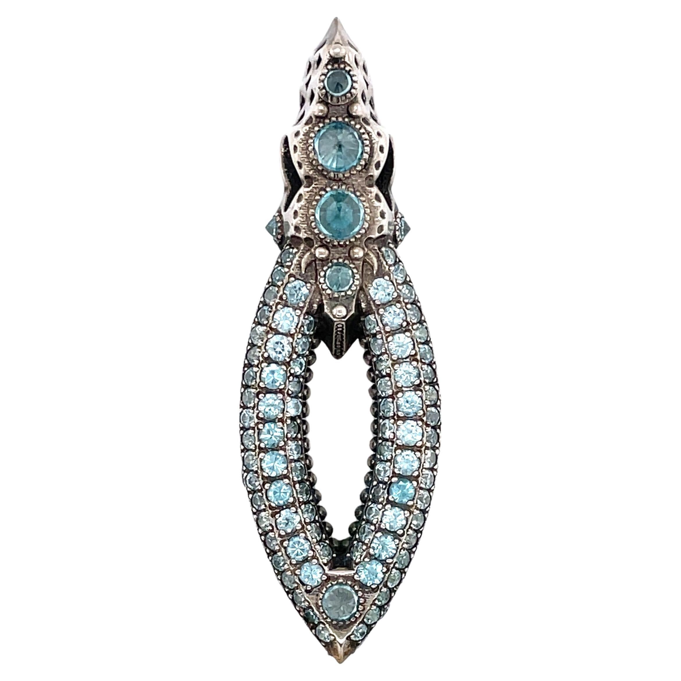 Vivid sky blue facet cut topaz gemstones glisten on this majestic sterling silver marquise shaped pendant expertly hand fabricated by jewelry designer and artisan Ben Harju. From the B. Harju Flotus Collection, Ben's self described focus on