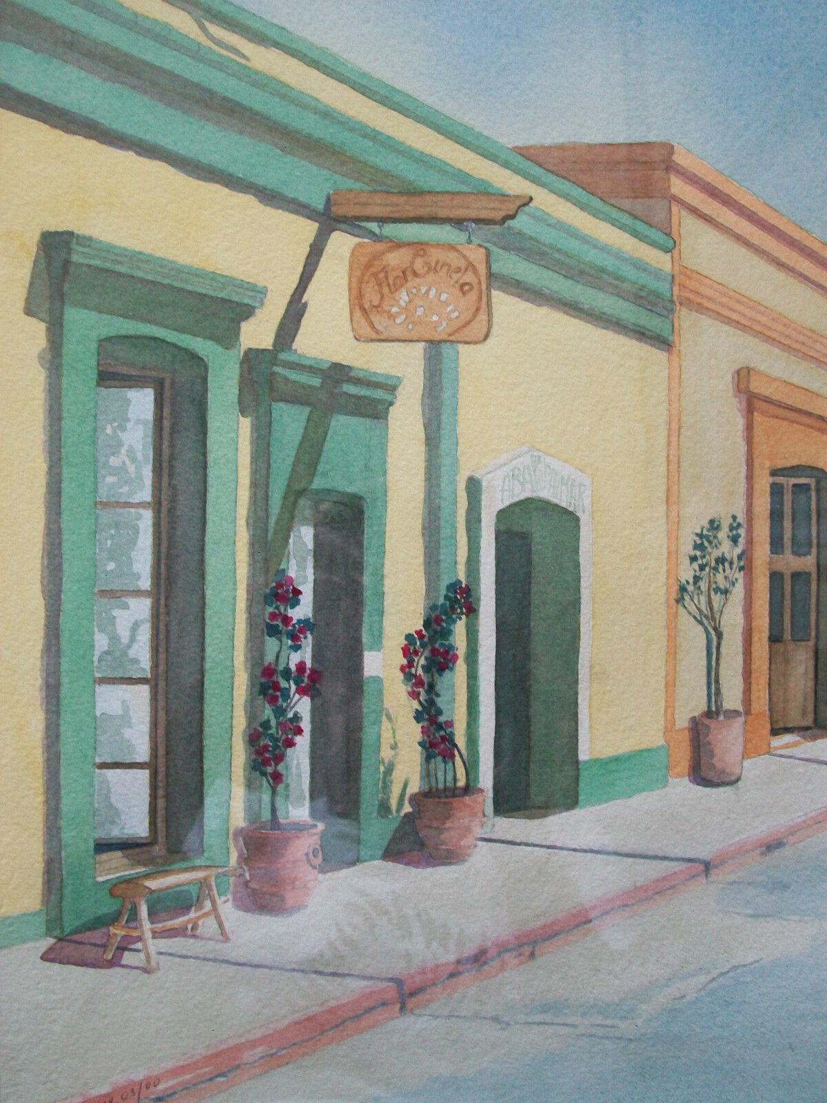 B. McKAY - Calle Alvaro Obregon - San Jose del Cabo - Aquarelle vintage sur papier - signée et datée en bas à gauche - titrée et datée au verso - contenue dans un cadre métallique finition bronze - finie avec un carton mat à bord biseauté unique -