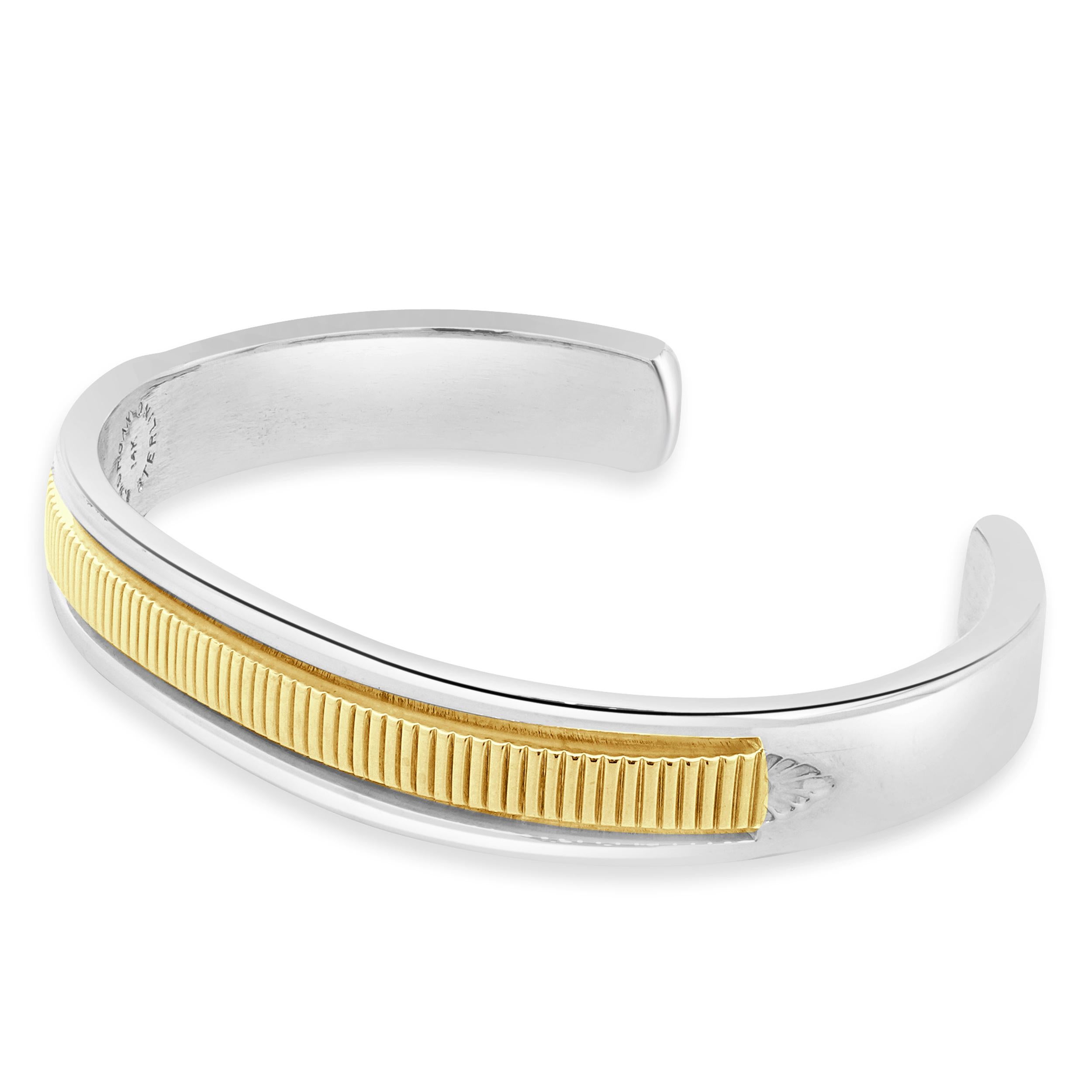 Diseñadora: B. Morgan
Material: Oro amarillo de 14 quilates / plata de ley
Dimensiones: la pulsera se ajusta a una muñeca de 6.5 pulgadas
Peso: 45,30 gramos
