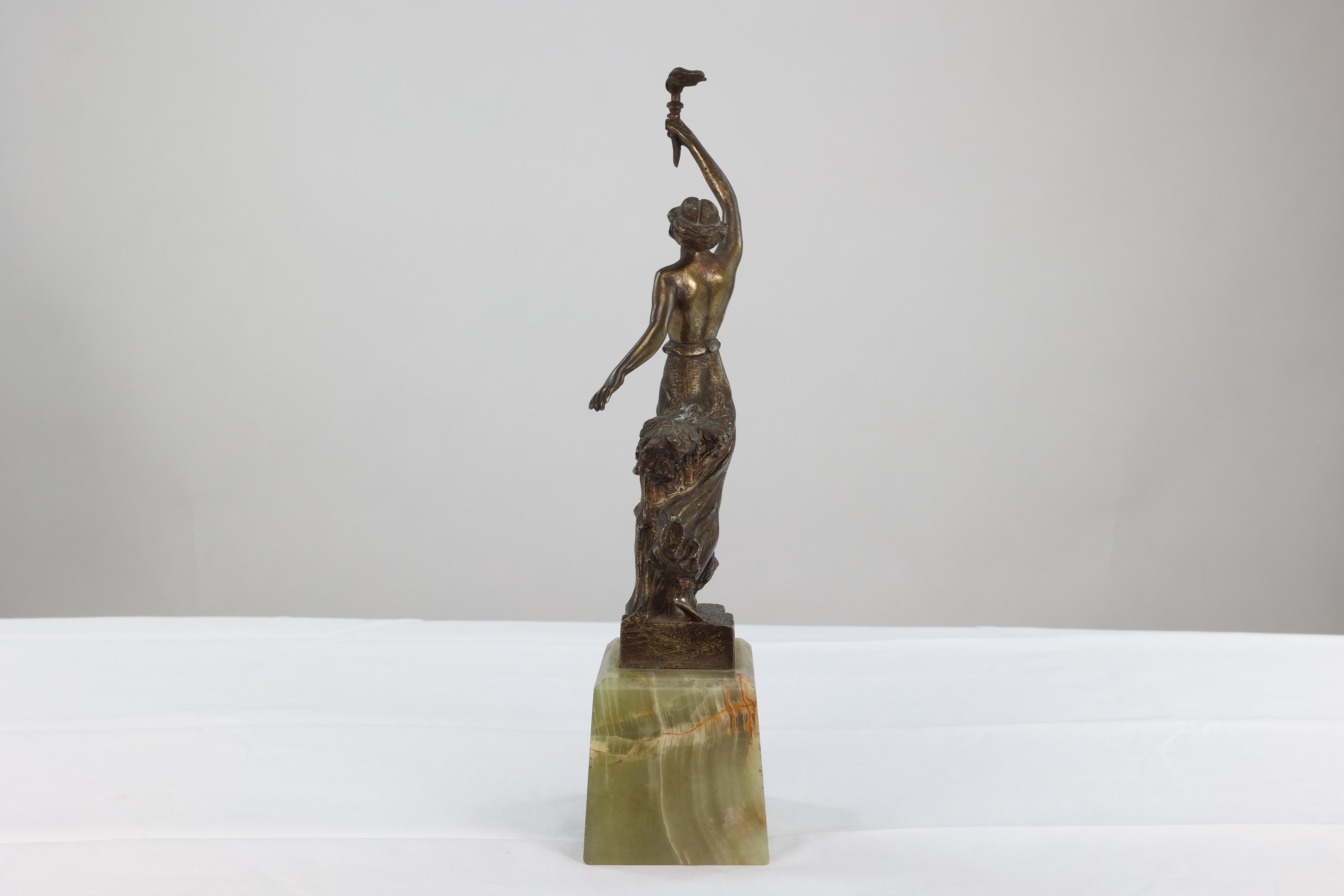 B V Fernandez. An Art Deco bronze figure on an onyx base For Sale 6