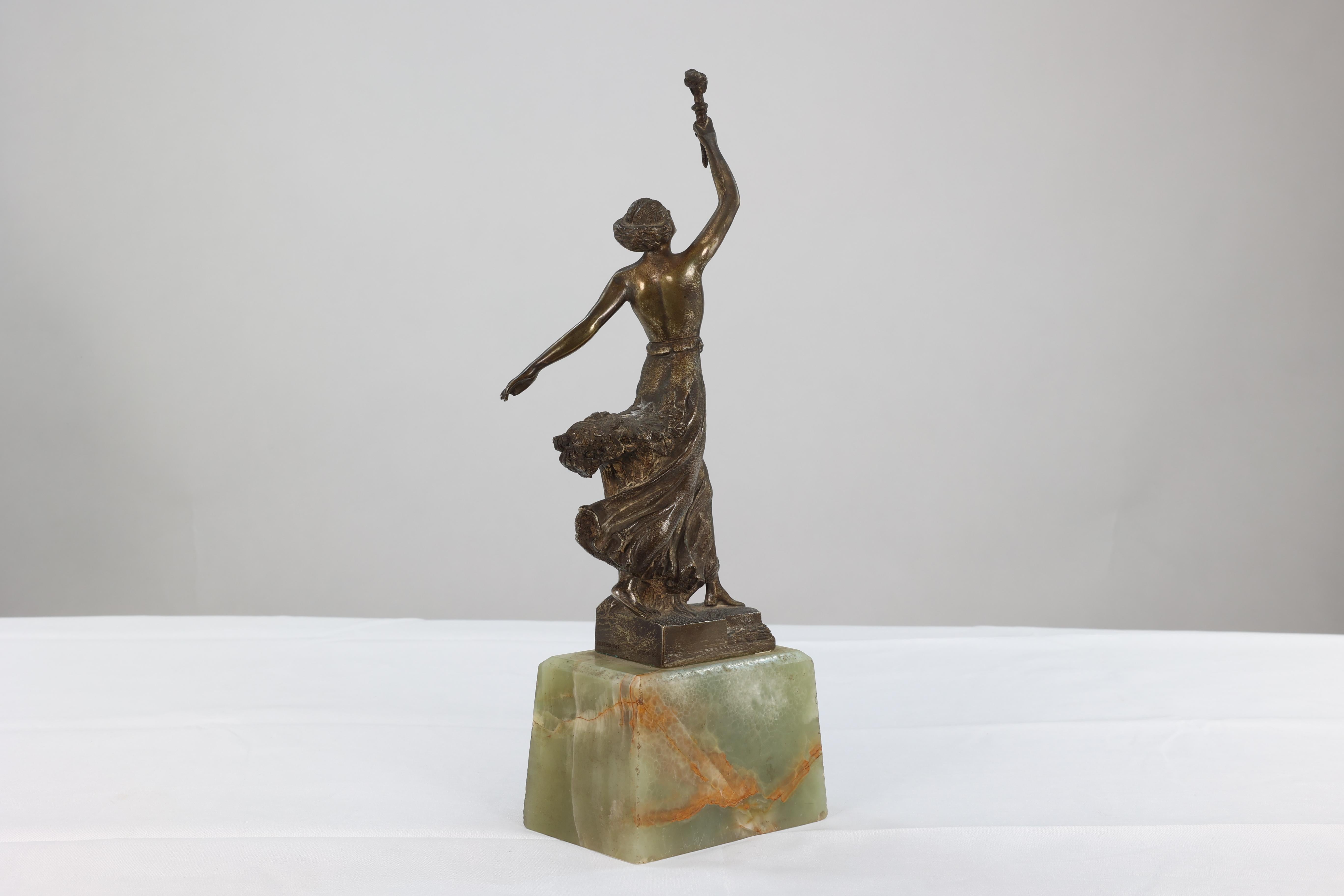 B V Fernandez. An Art Deco bronze figure on an onyx base For Sale 7