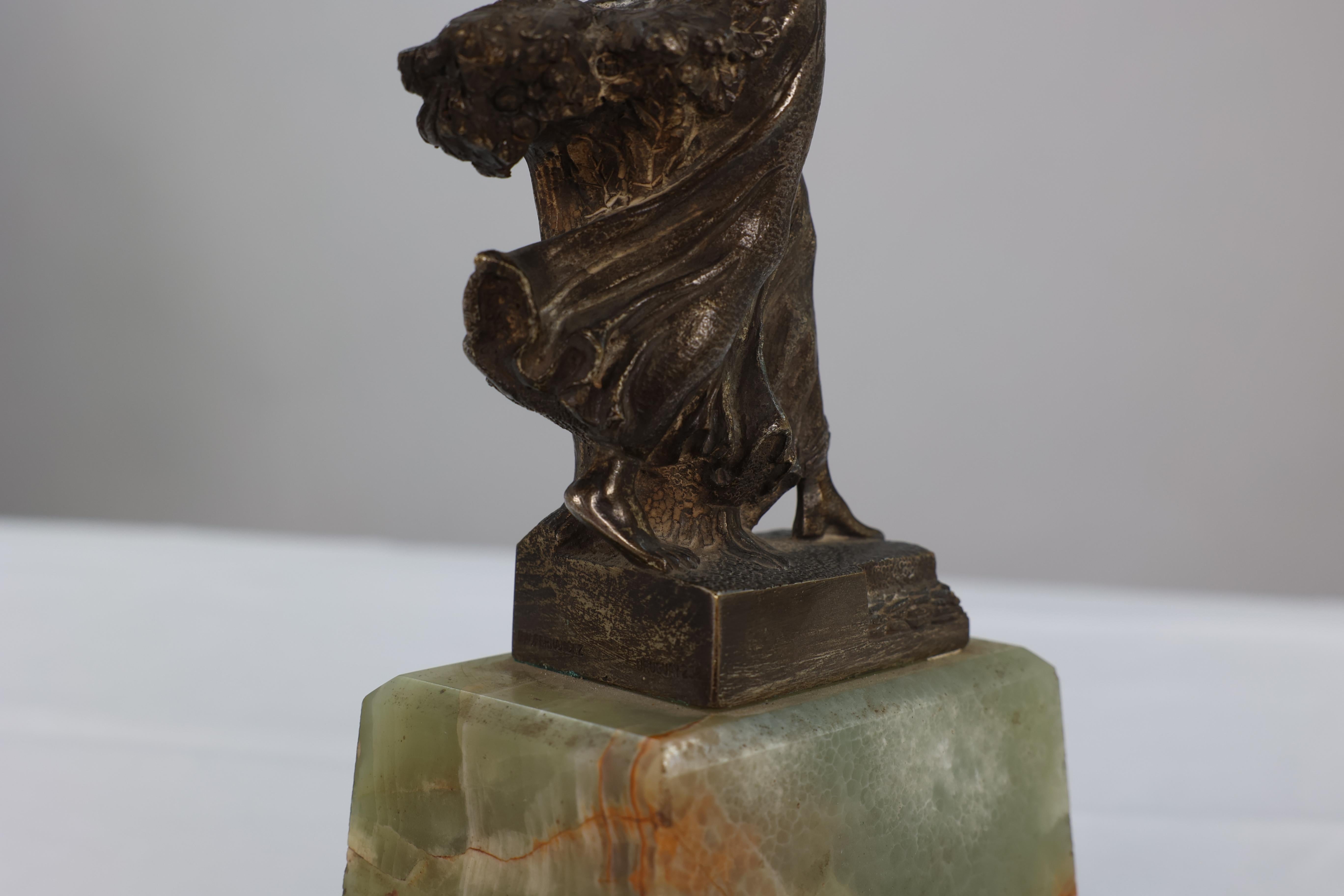 B V Fernandez. An Art Deco bronze figure on an onyx base For Sale 4