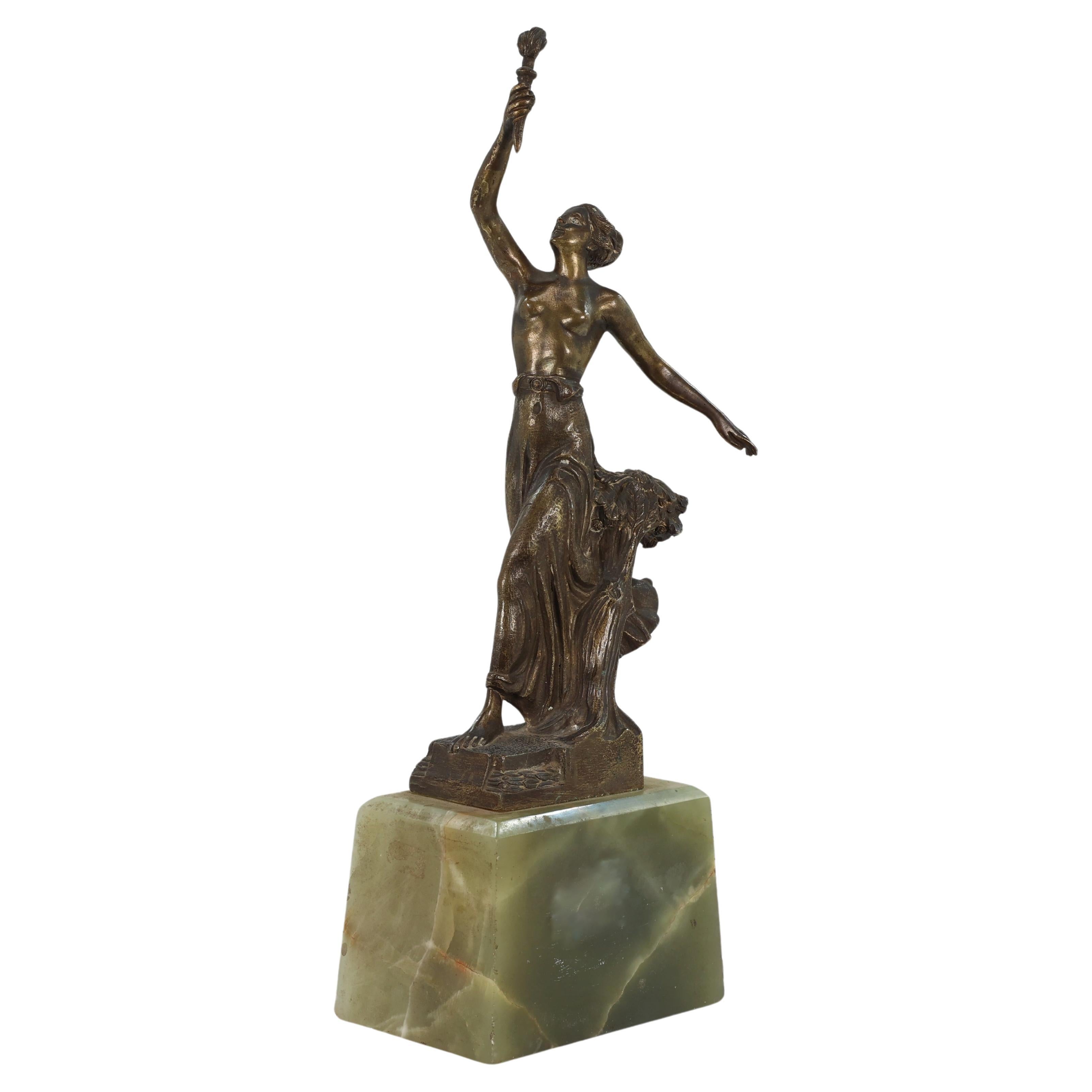 B V Fernandez. An Art Deco bronze figure on an onyx base