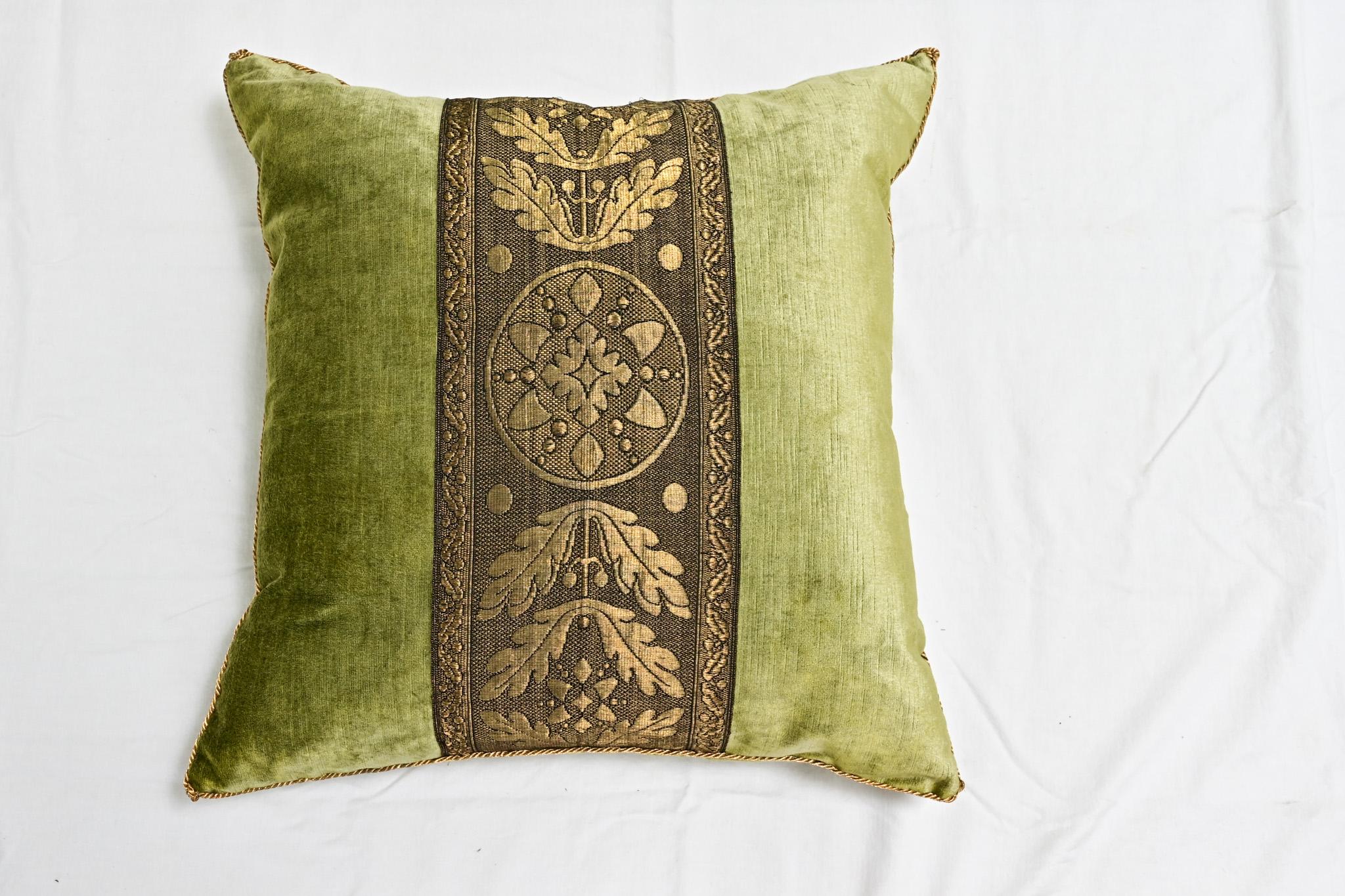 A single pillow made from a beautiful chartreuse velvet. Hand trimmed with vintage gold metallic cording, knotted in the corners. Designed by Rebecca Vizard for B. Viz Design. This down filled pillow features an unusually wide, antique gold metallic