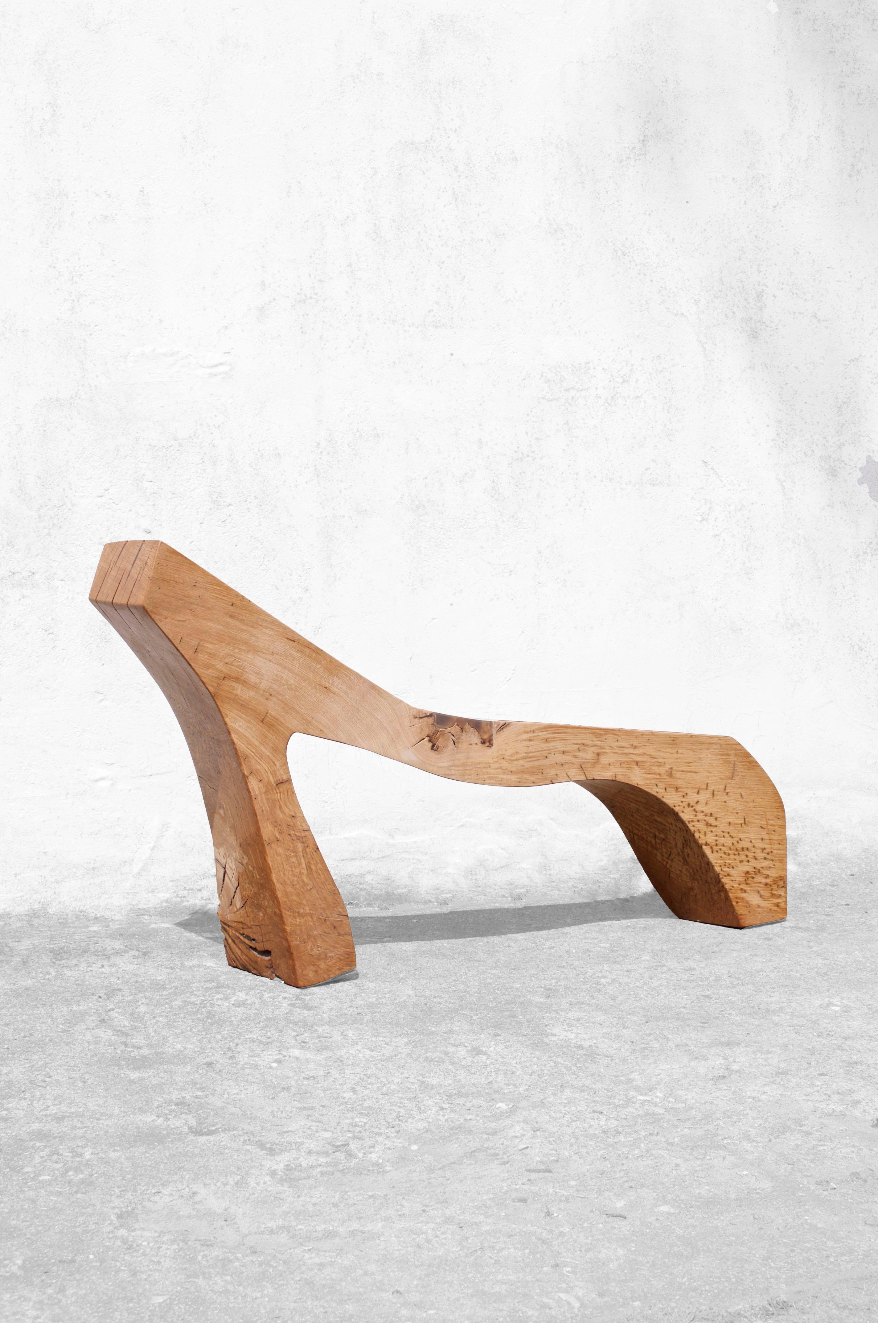B2441 Bench in Oak Wood by Jörg Pietschmann
Dimensions: D 20 x W 160 x H 120 cm.
Materials: Oak.

In Pietschmann’s sculptures, trees that for centuries were part of a landscape and founded in primordial forces tell stories inscribed in the memory of
