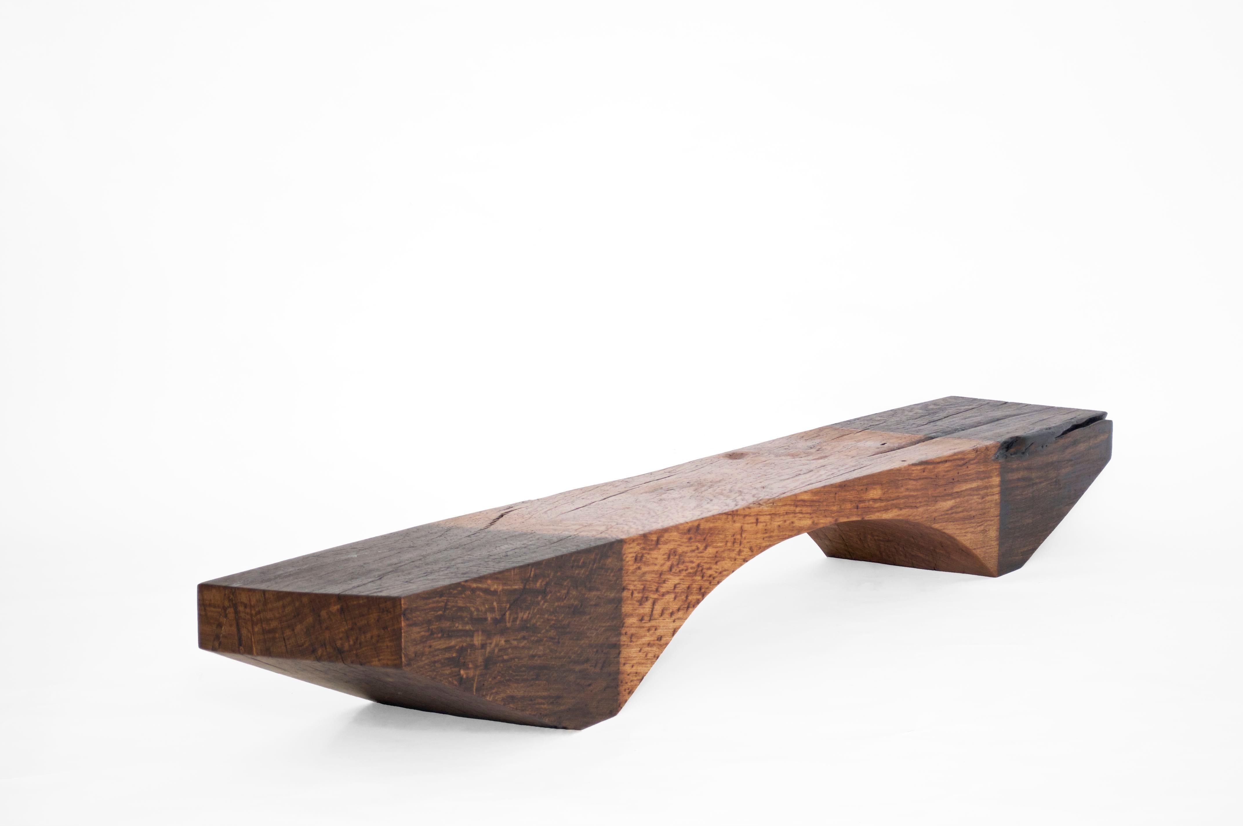 B2451 Bench in Pointed Oak Wood by Jörg Pietschmann
Dimensions: D 34 x W 208 x H 24 cm.
Materials: Oak wood.

In Pietschmann’s sculptures, trees that for centuries were part of a landscape and founded in primordial forces tell stories inscribed in