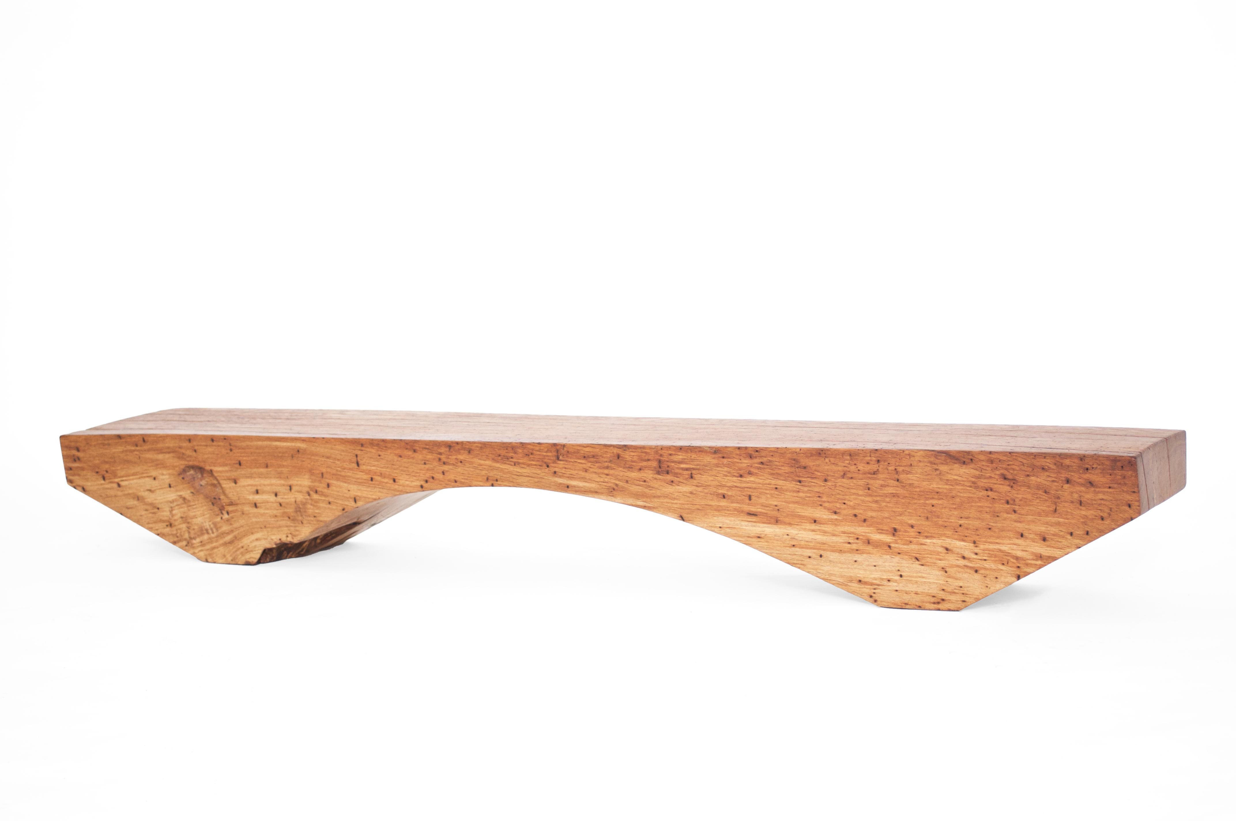 B2461 Bench in Pointed Oak Wood by Jörg Pietschmann
Dimensions: D 29 x W 165 x H 21 cm.
Materials: Oak wood.

In Pietschmann’s sculptures, trees that for centuries were part of a landscape and founded in primordial forces tell stories inscribed in