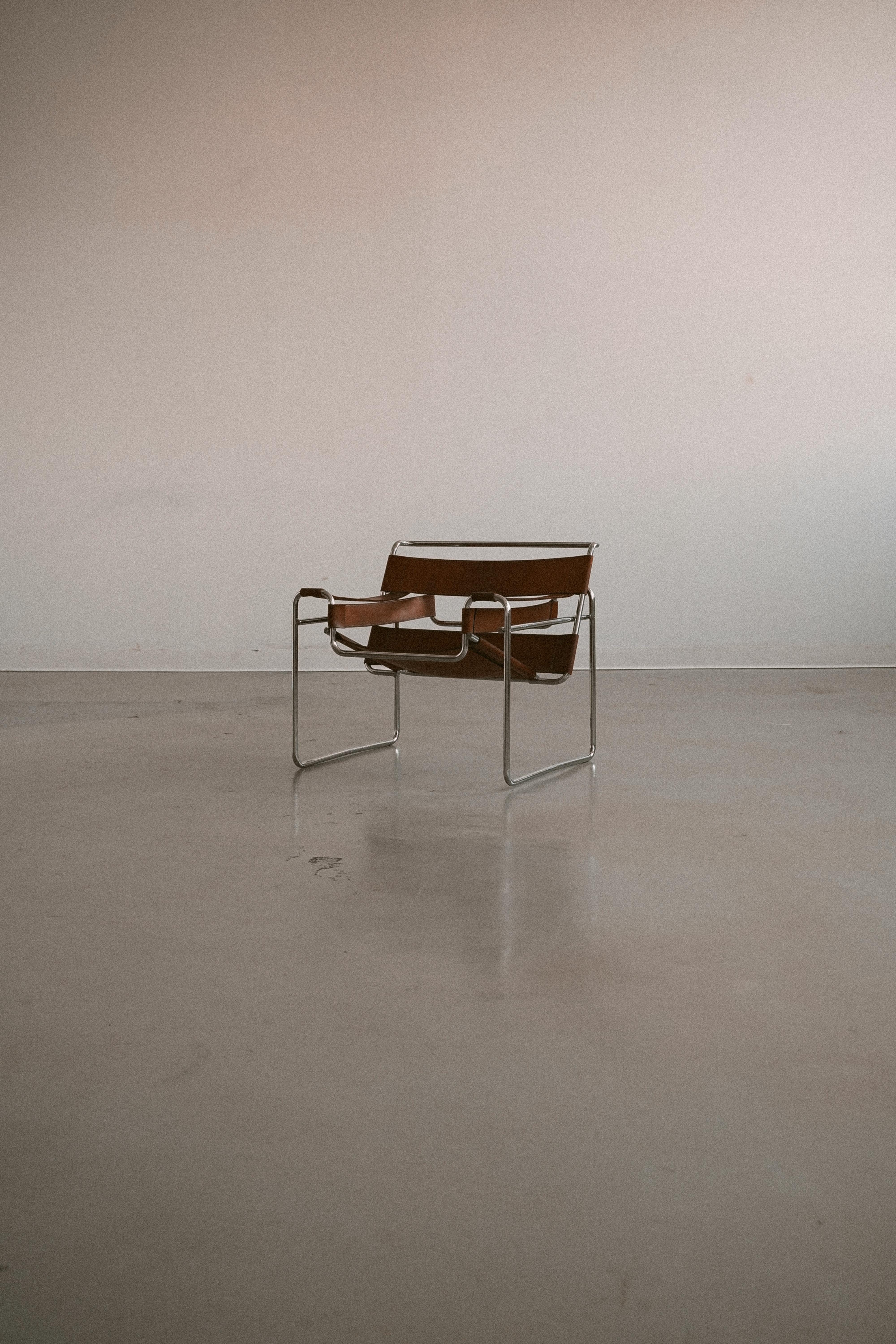 This Bauhaus icon designed by Marcel Breuer in the 1920s as the B3, with this example in particular having a gorgeous saddle brown leather with a nice patina. Indications contributing to the Gavina production lineup attribution include the high