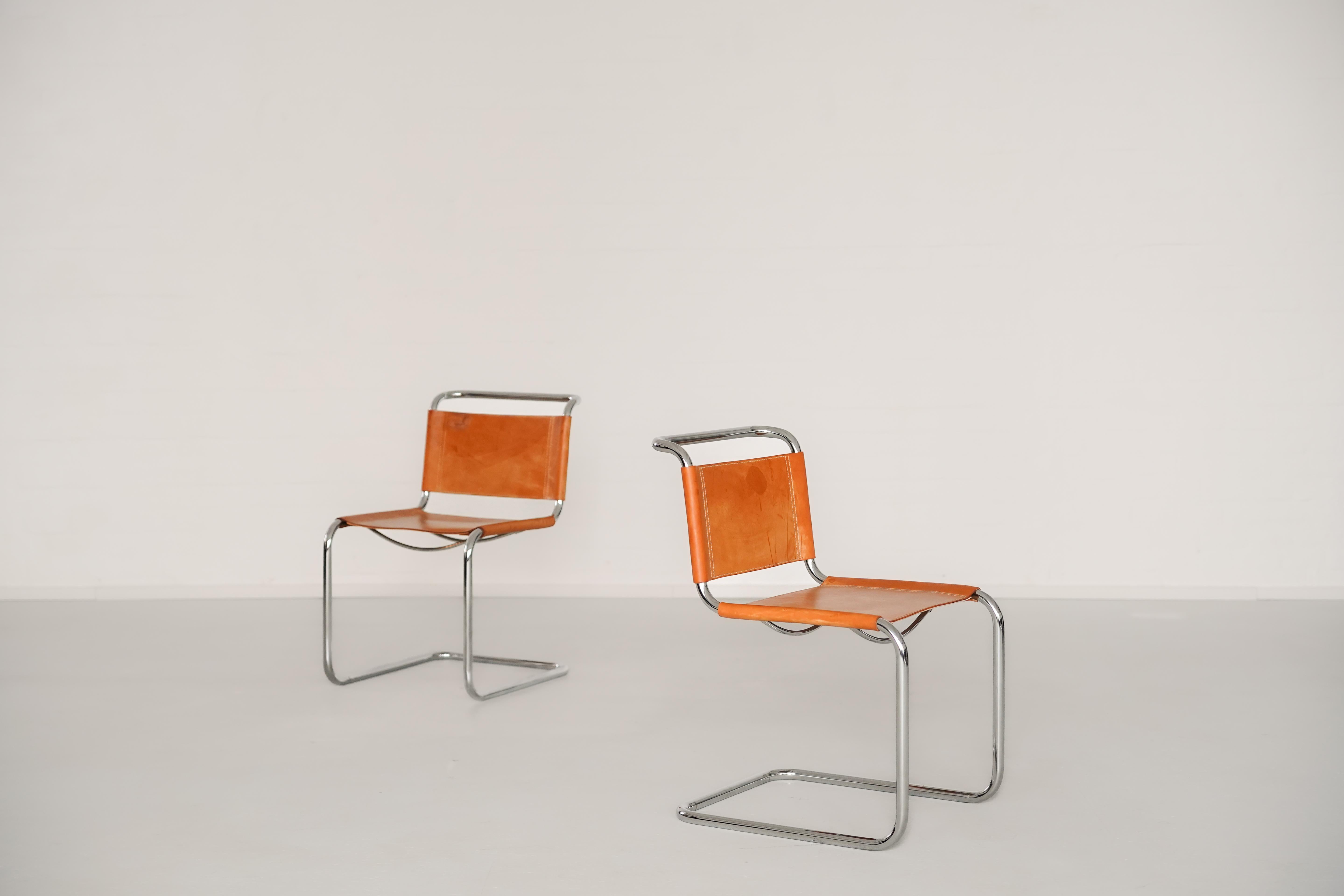 These cantilever chairs, designed by Marcel Breuer in the 1920s, are enduring icons of modernist design. With their revolutionary tubular steel frame and suspended seat construction, Breuer redefined the relationship between form and