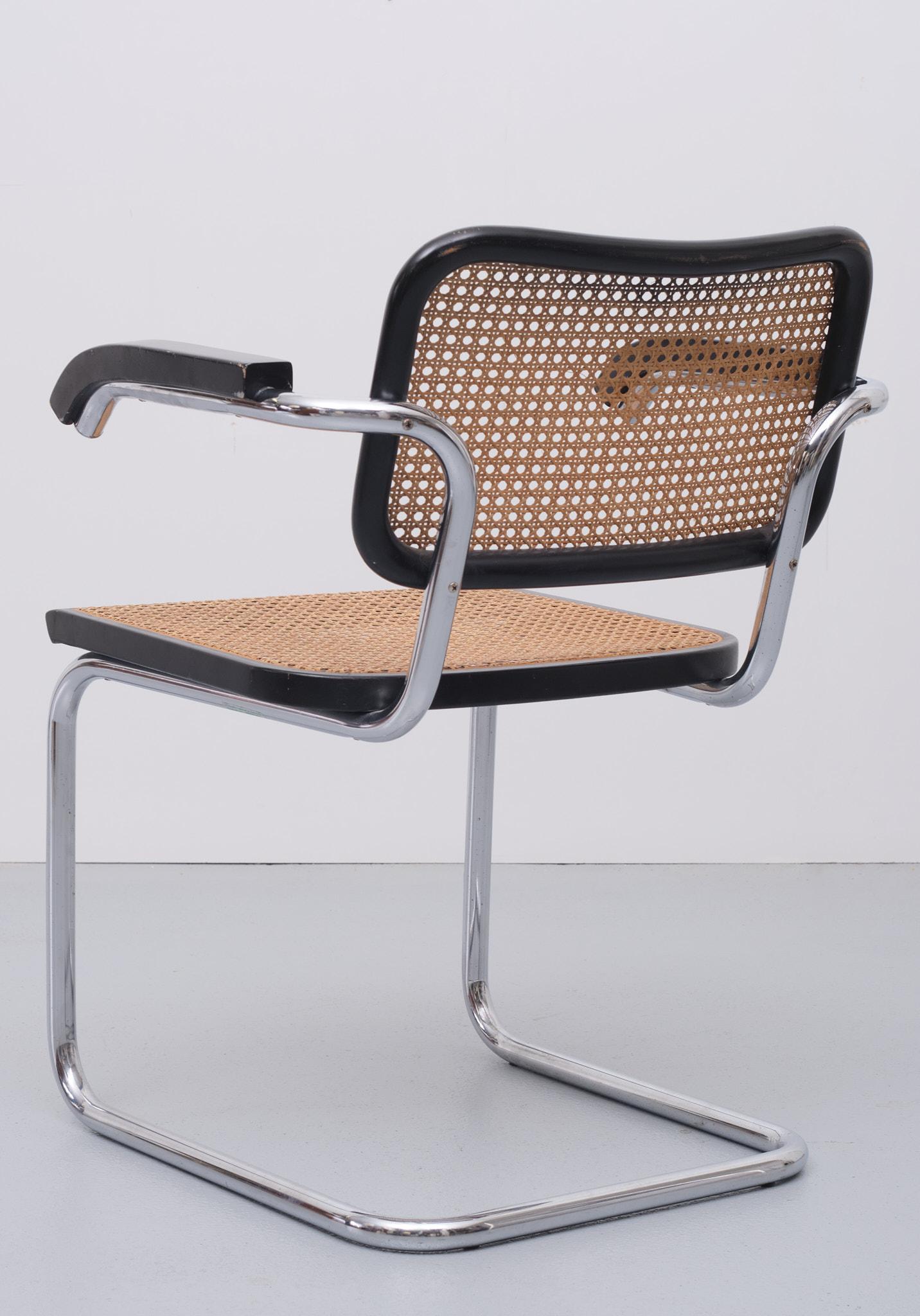 Black Cantilever 'S64' dining chair by Marcel Breuer for Cidue, Italy 1970s.
Good seating comfort. Classic design. This one is signed. Good condition.