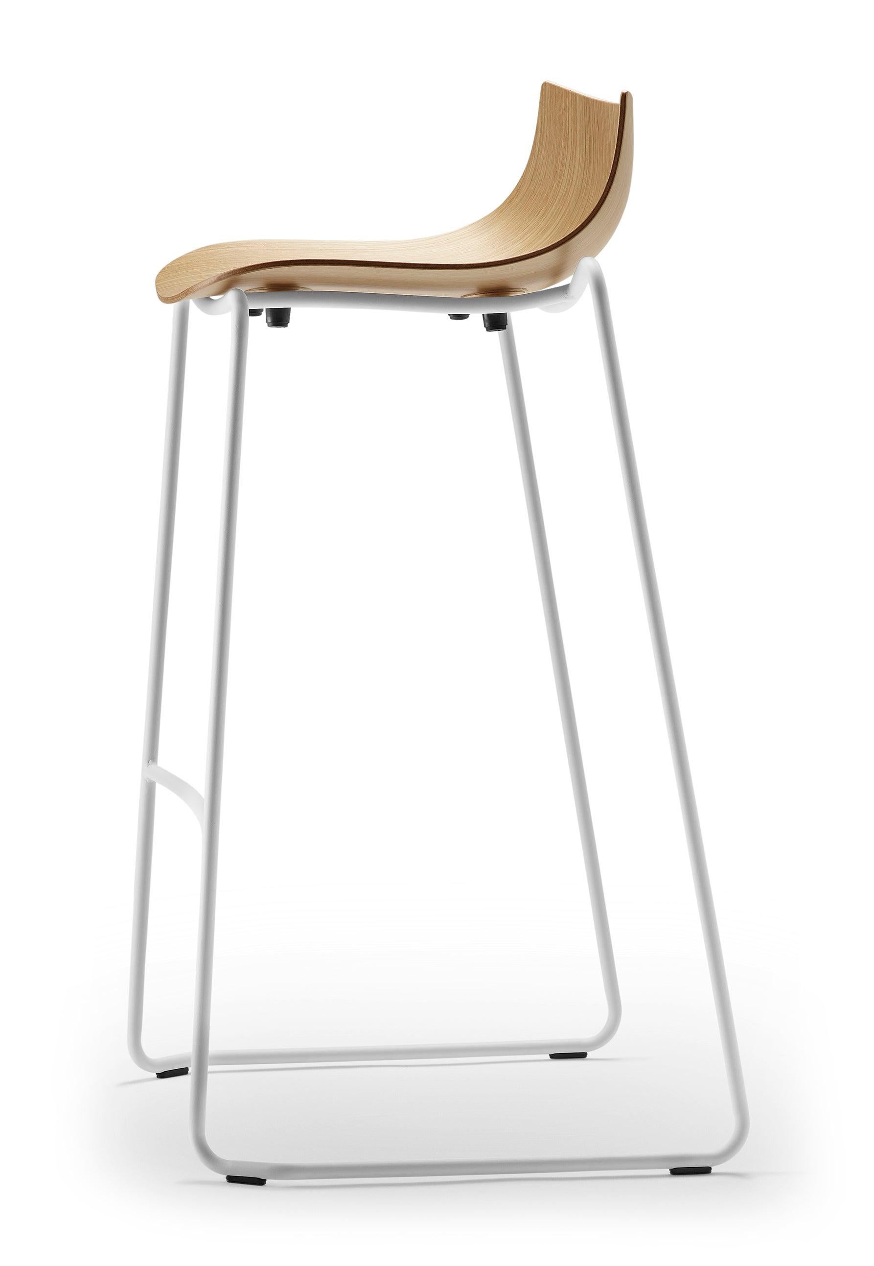 The BA004T Preludia bar chair by Brad Ascalon combines quality materials for an appealing and functional design. The chair has a well-crafted, solid construction that is light and uncomplicated in form. It can be paired with other items from the