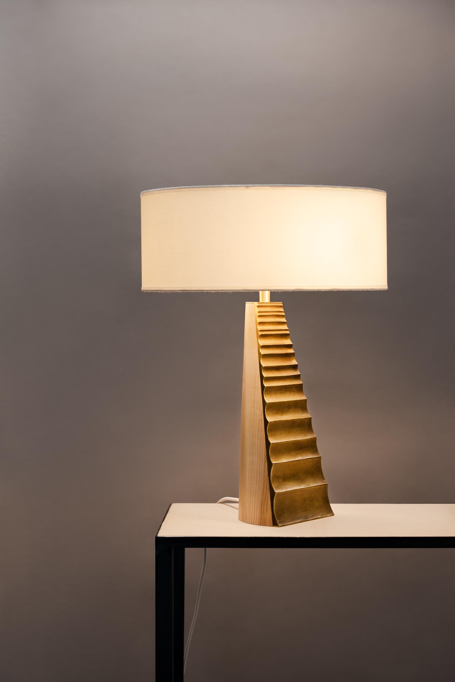 Babel table lamp by Atelier Demichelis
Numbered and Signed
Dimensions: D 45 x H 61 cm
Materials: bronze, brass, ash wood

Laura Demichelis

Laura was born & brought up in Provence, in the south of France.
Trained at the École Boulle in