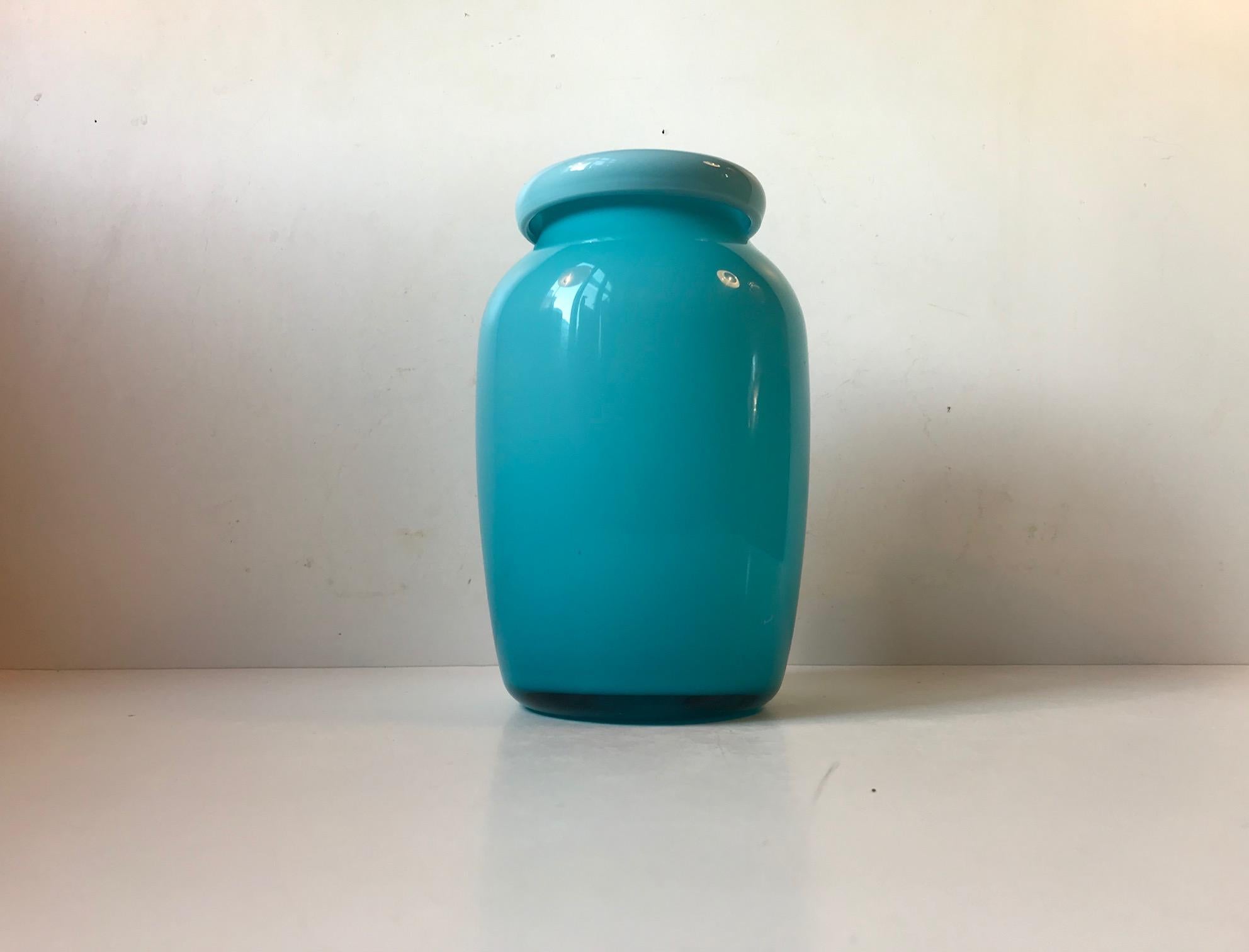 A rare baby-blue cased opaline glass vase by Michael Bang for Holmegaard, circa 1970. It is hand blown and features a folded collar. It is probably a piece-unique inspired by the 'Palet' series.