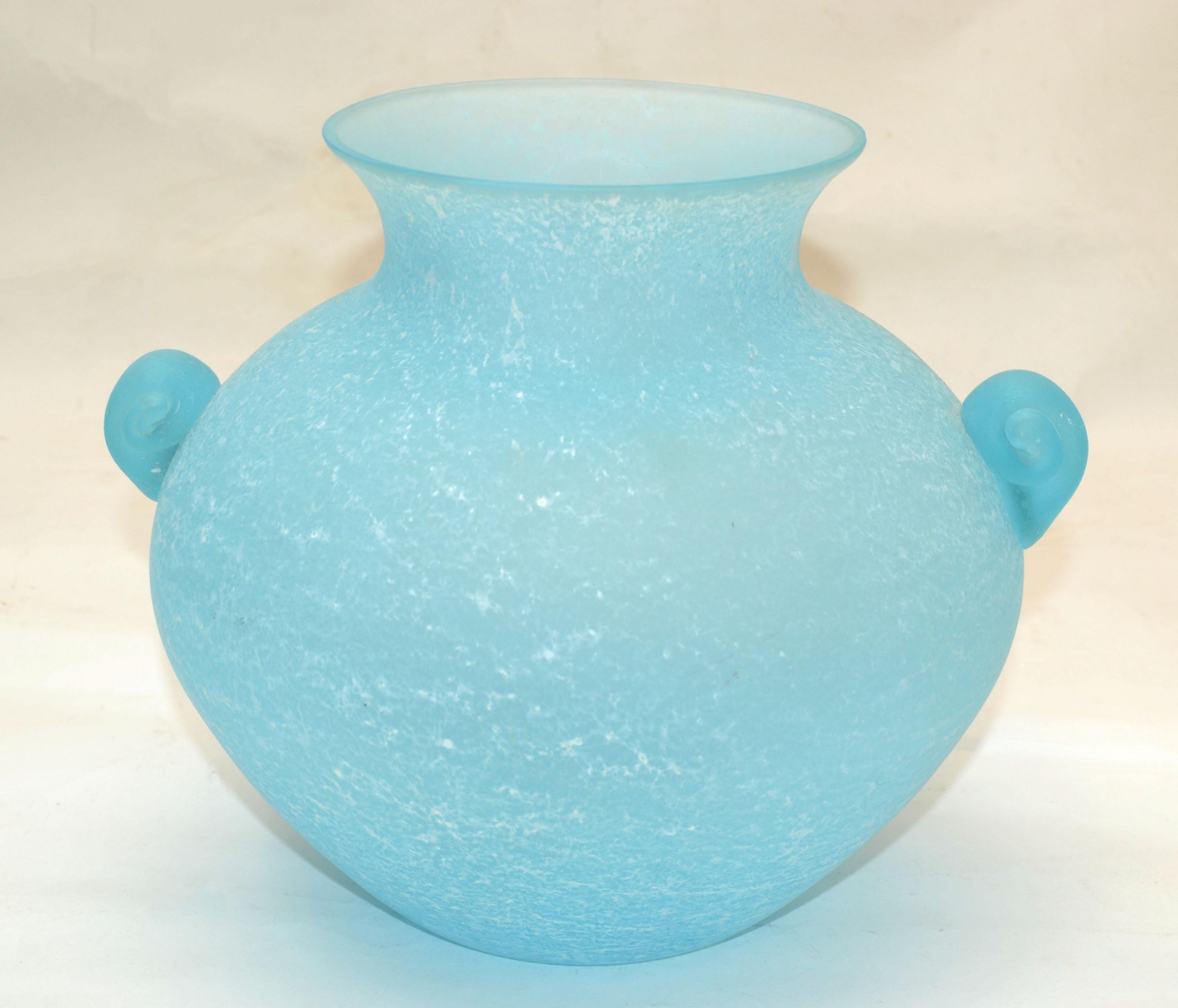 Mid-Century Modern Baby Blue Scavo glass Murano Art glass bud vase, vessel, decanter Mid-Century Modern made in Italy in 1980.
Measures Handle to Handle: 9 inches.